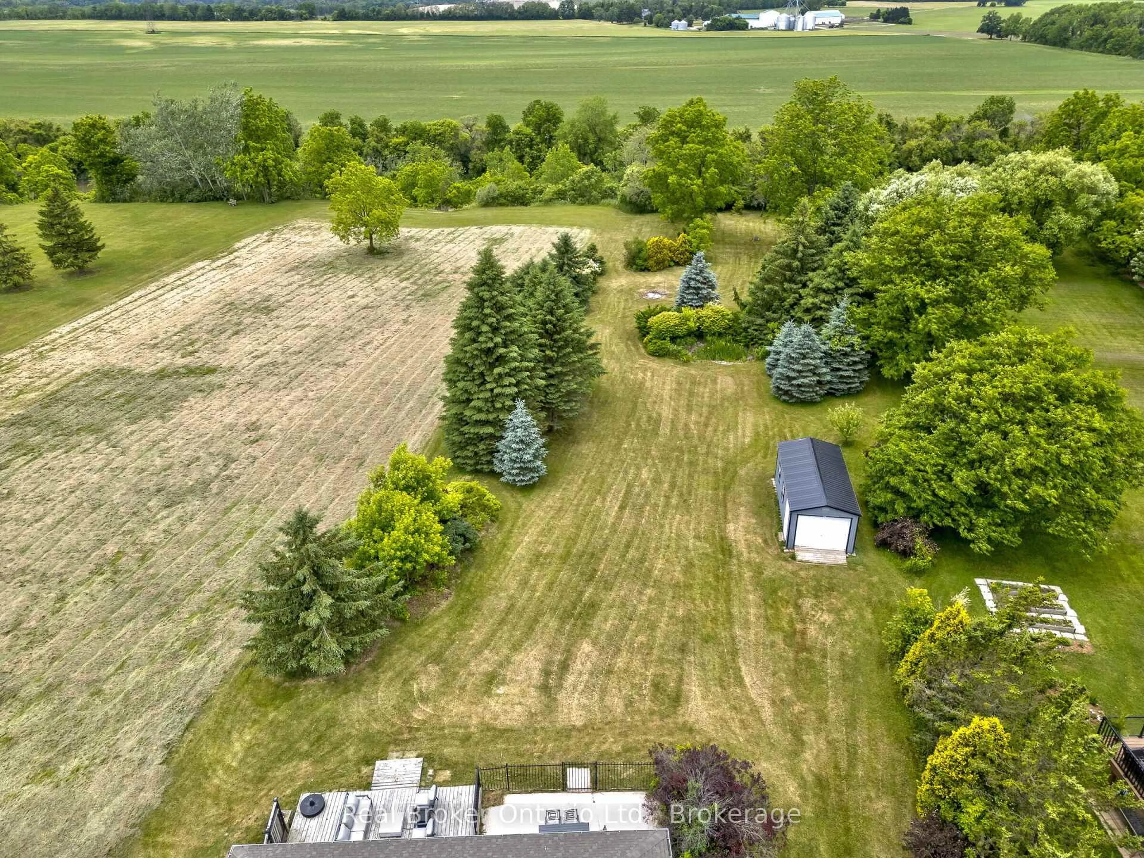 A pic from outside/outdoor area/front of a property/back of a property/a pic from drone, forest/trees view for 307 Brant County 18 Rd, Brant Ontario N3T 5L9