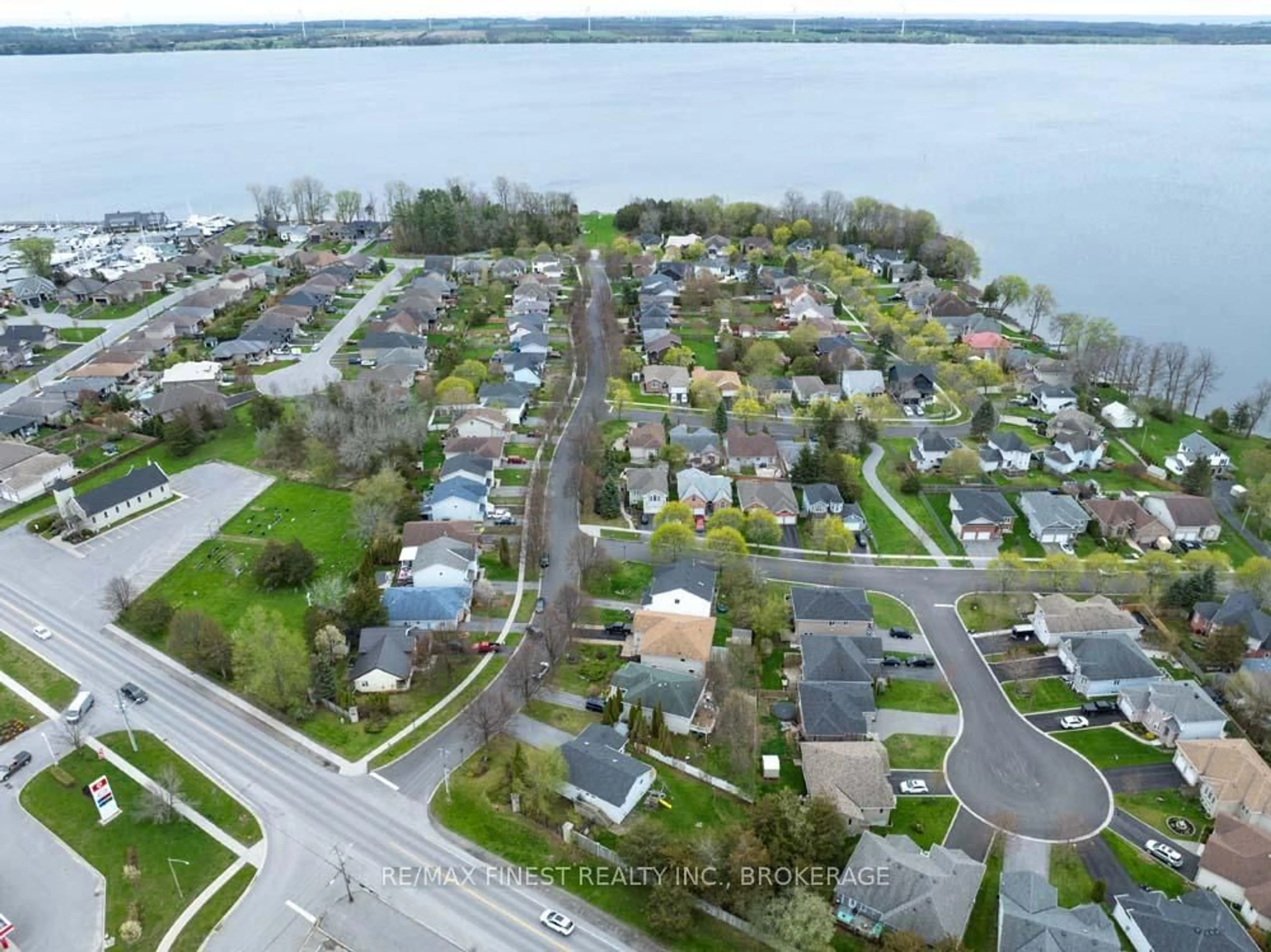 A pic from outside/outdoor area/front of a property/back of a property/a pic from drone, water/lake/river/ocean view for 1 Heritage Dr, Bath Ontario K0H 1G0