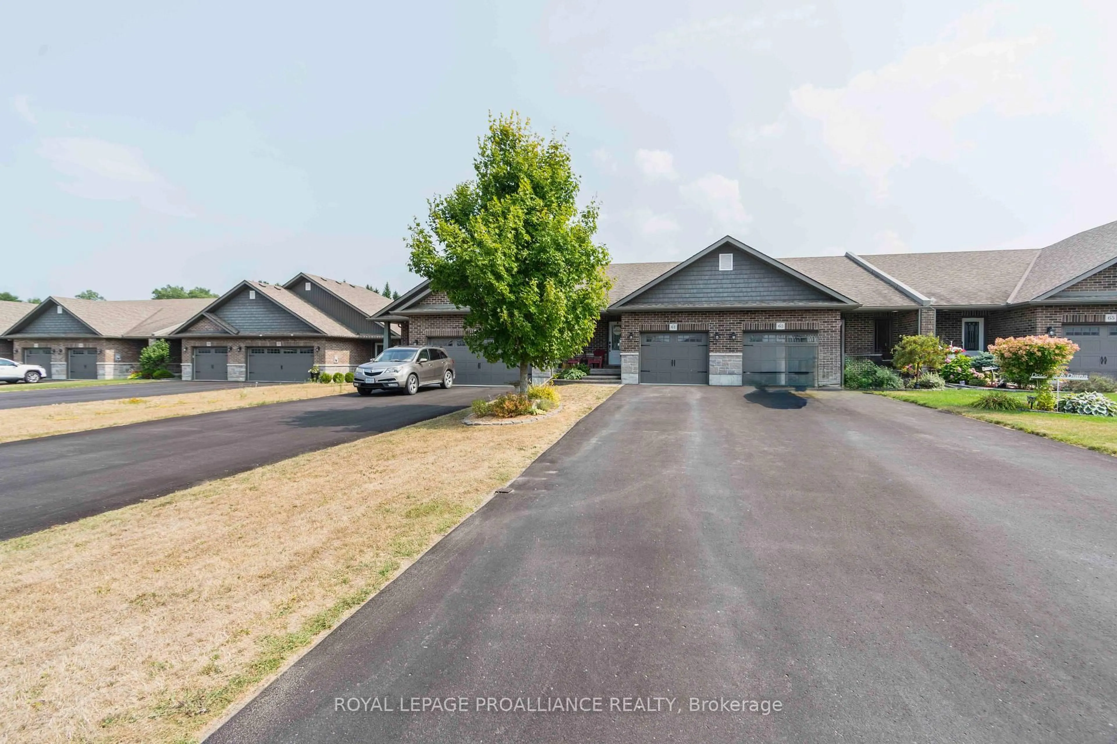 A pic from outside/outdoor area/front of a property/back of a property/a pic from drone, street for 61 Aspen Dr, Quinte West Ontario K8V 0E2