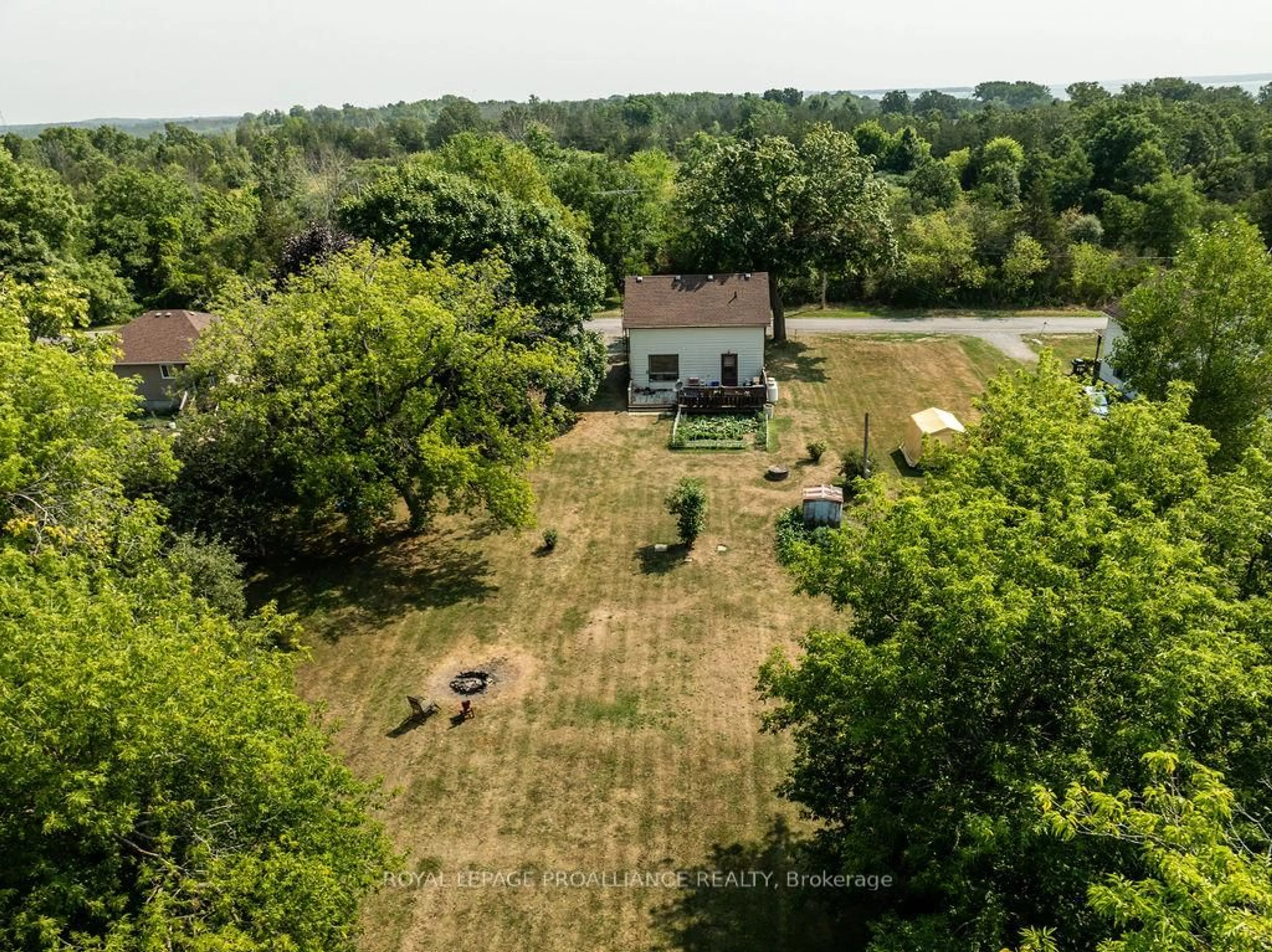 A pic from outside/outdoor area/front of a property/back of a property/a pic from drone, forest/trees view for 72 Doxtator Dr, Belleville Ontario K8N 4Z4