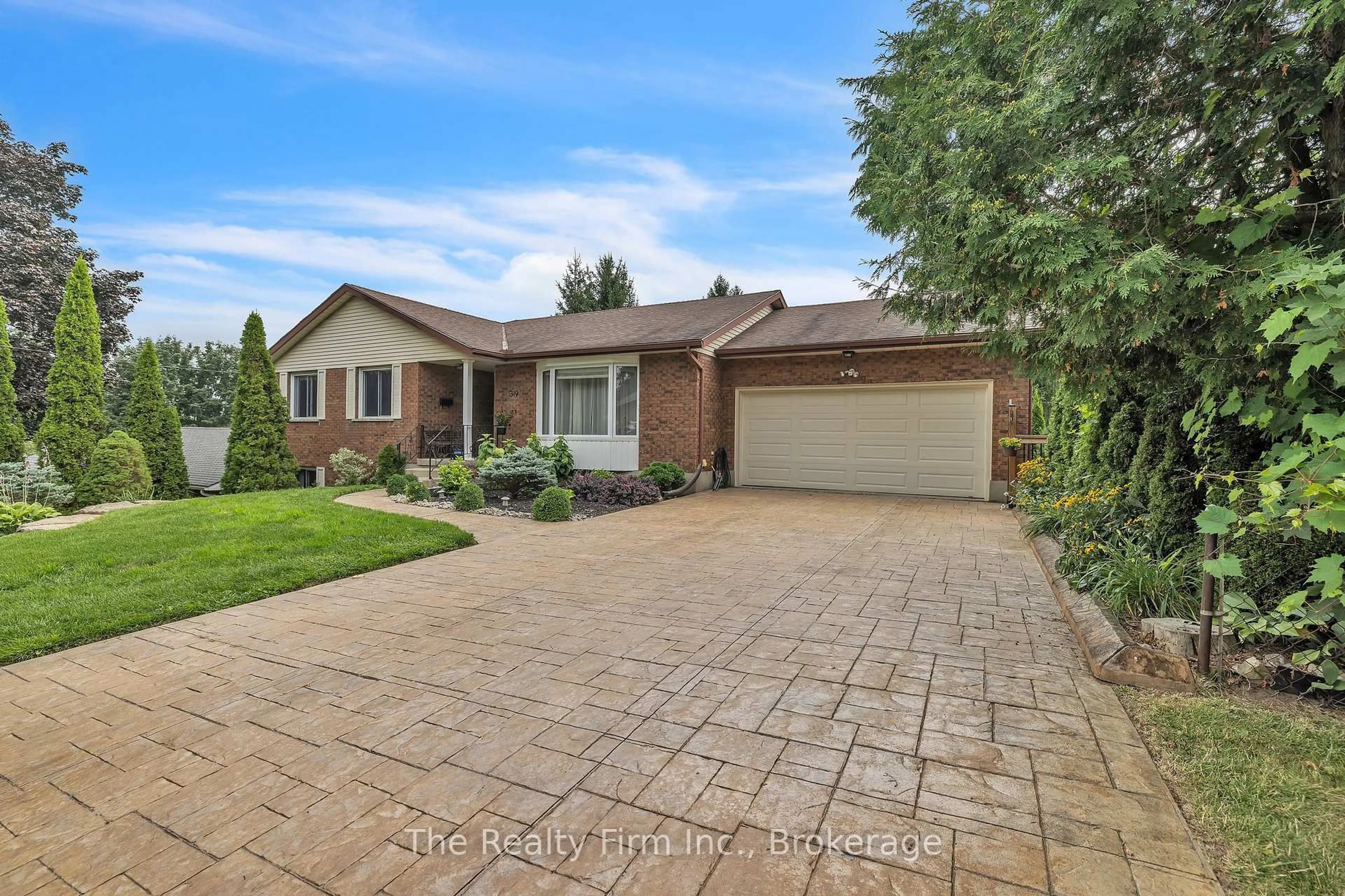 Home with brick exterior material, street for 319 Robinson St, Woodstock Ontario N4S 3B8