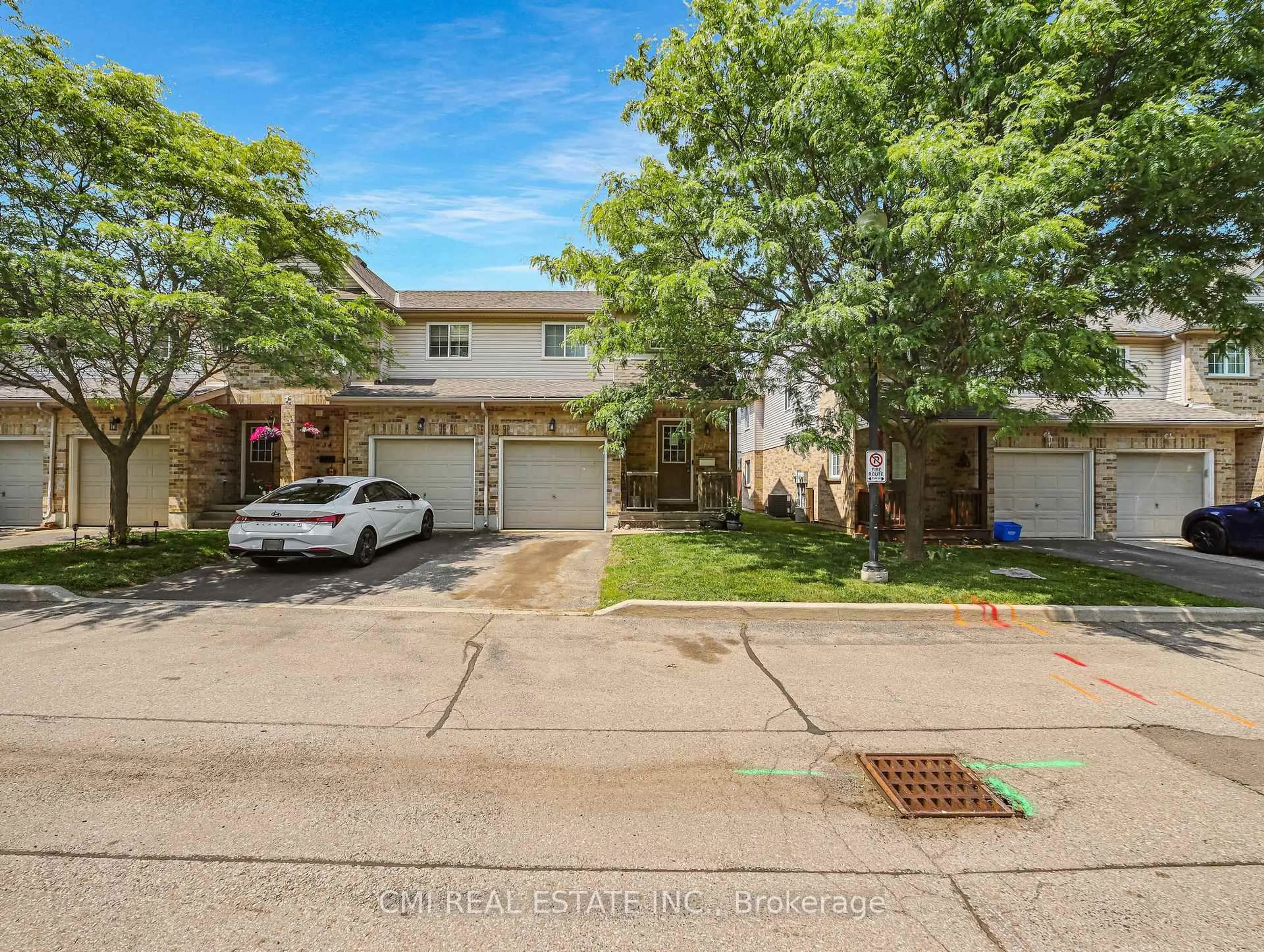 A pic from outside/outdoor area/front of a property/back of a property/a pic from drone, street for 169 Bismark Dr #33, Cambridge Ontario N2H 5S6