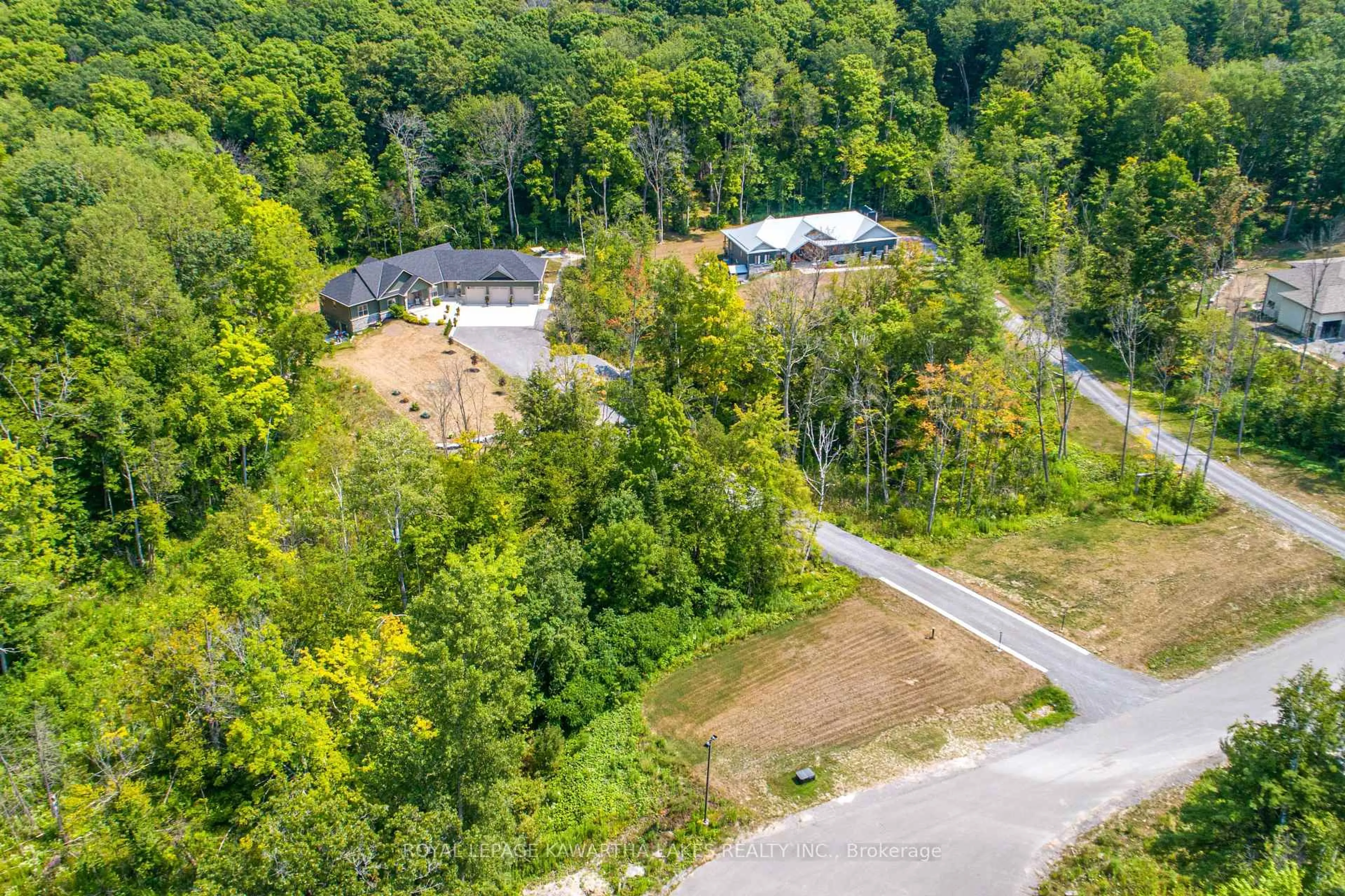 A pic from outside/outdoor area/front of a property/back of a property/a pic from drone, forest/trees view for 18 New Pierce Dr, Stirling Ontario K0K 3E0