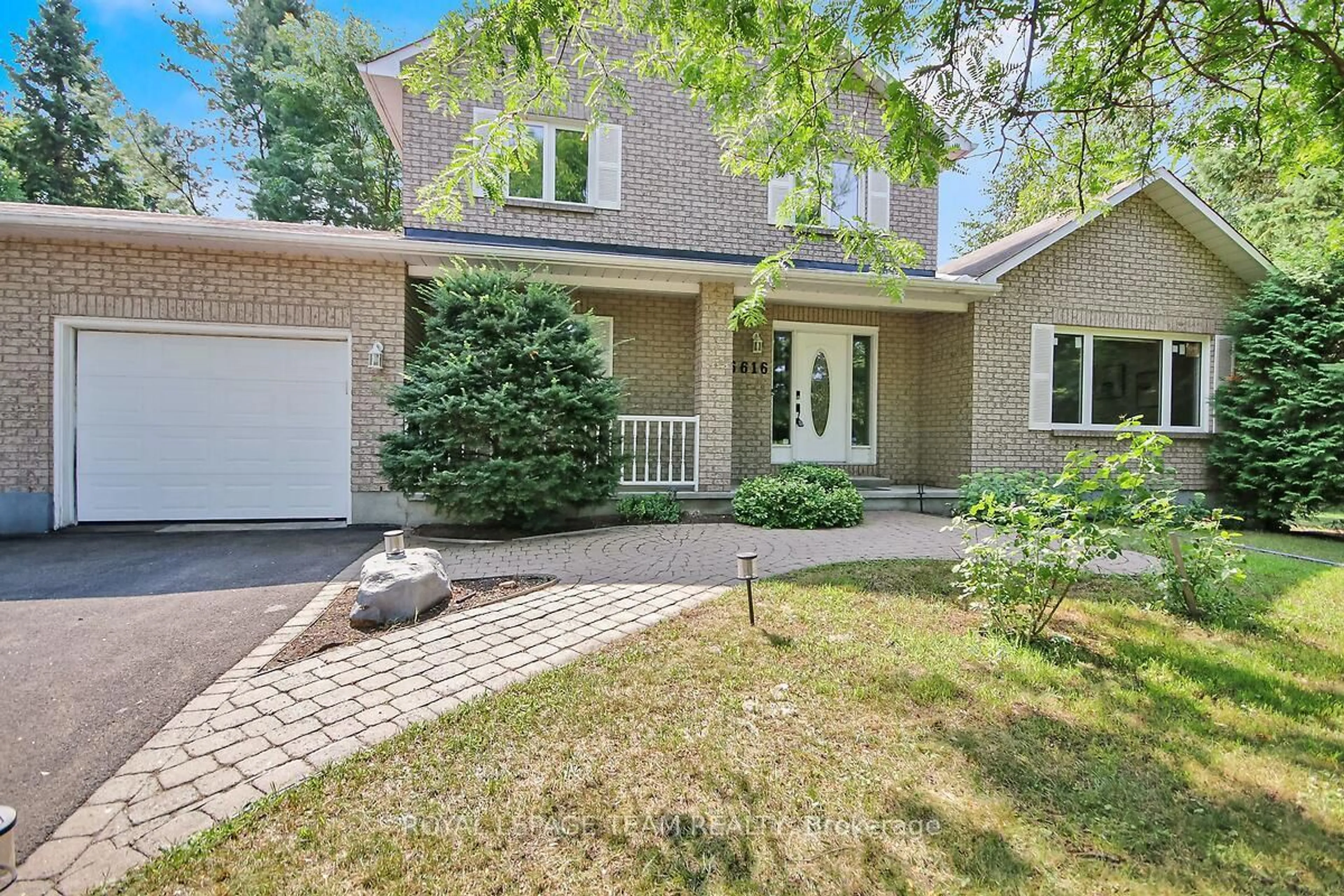 Home with brick exterior material, street for 6616 SUNCREST Dr, Ottawa Ontario K4P 1B3