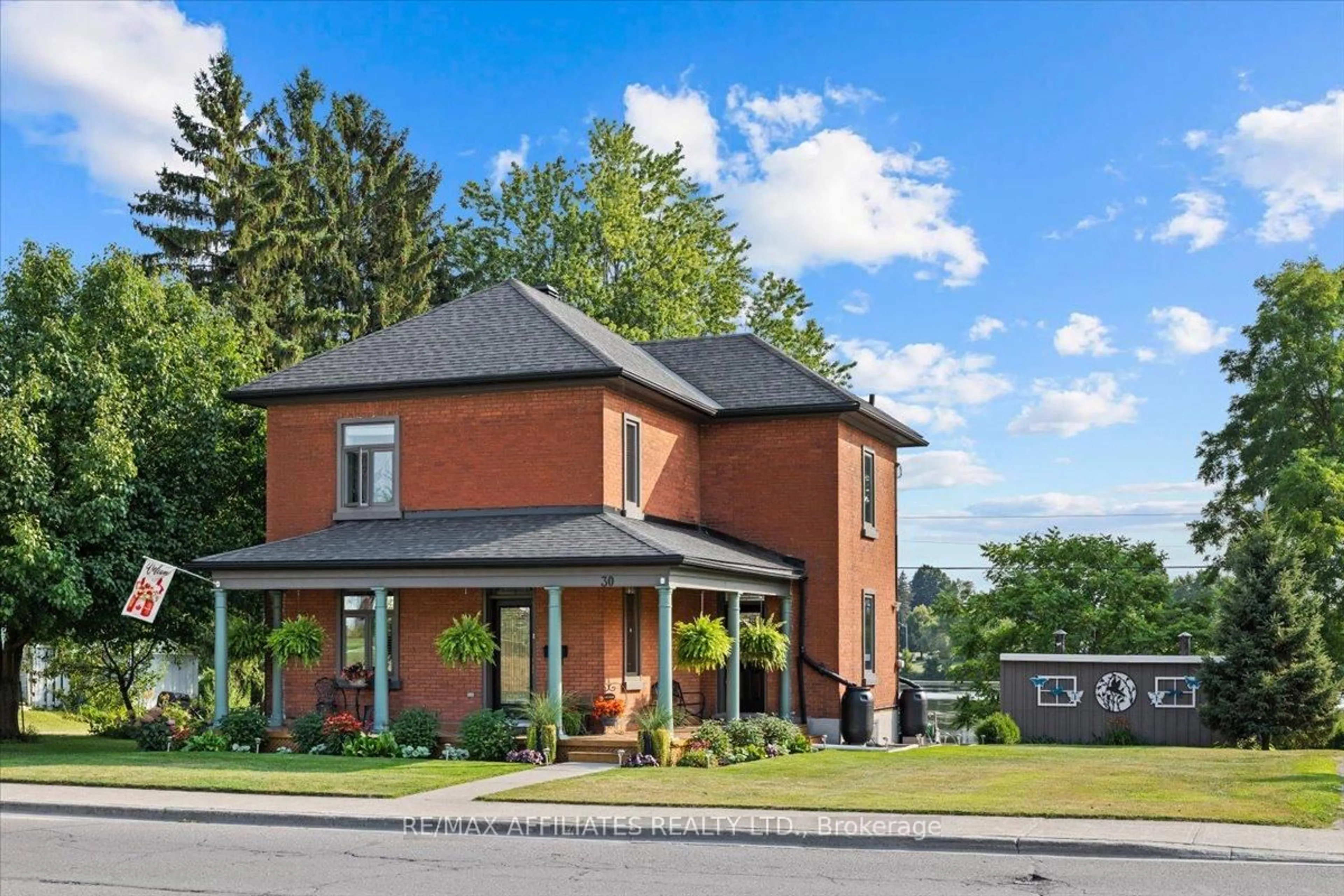 Home with brick exterior material, street for 30 Queen St, Smiths Falls Ontario K7A 3N2