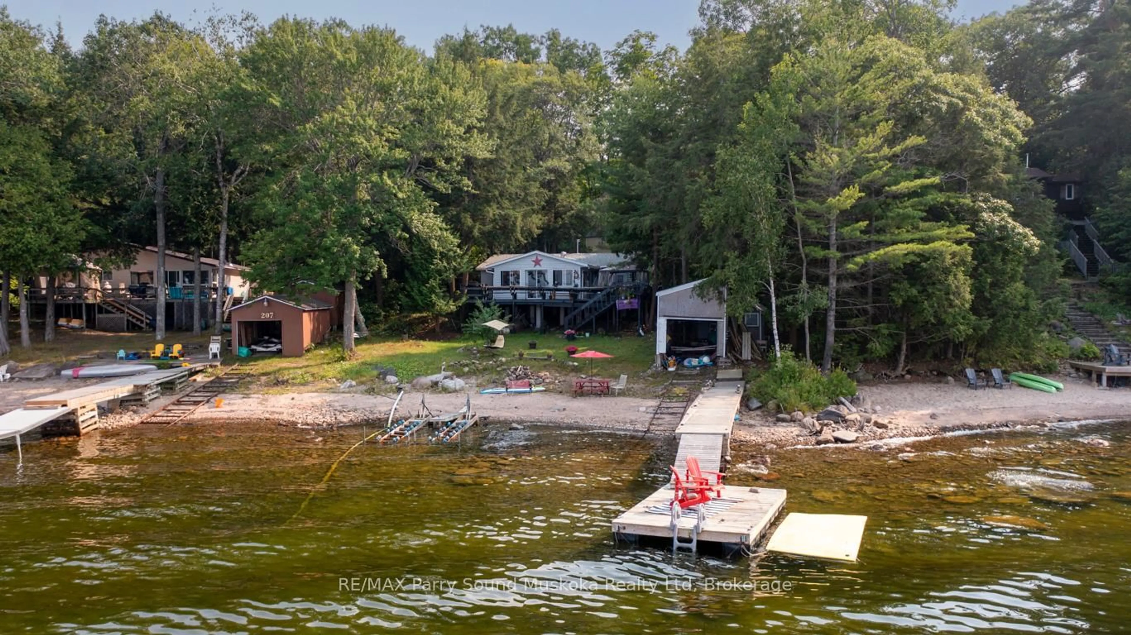 A pic from outside/outdoor area/front of a property/back of a property/a pic from drone, water/lake/river/ocean view for 808 Paradise Lane #Lot 206, Carling Ontario P2A 2X4