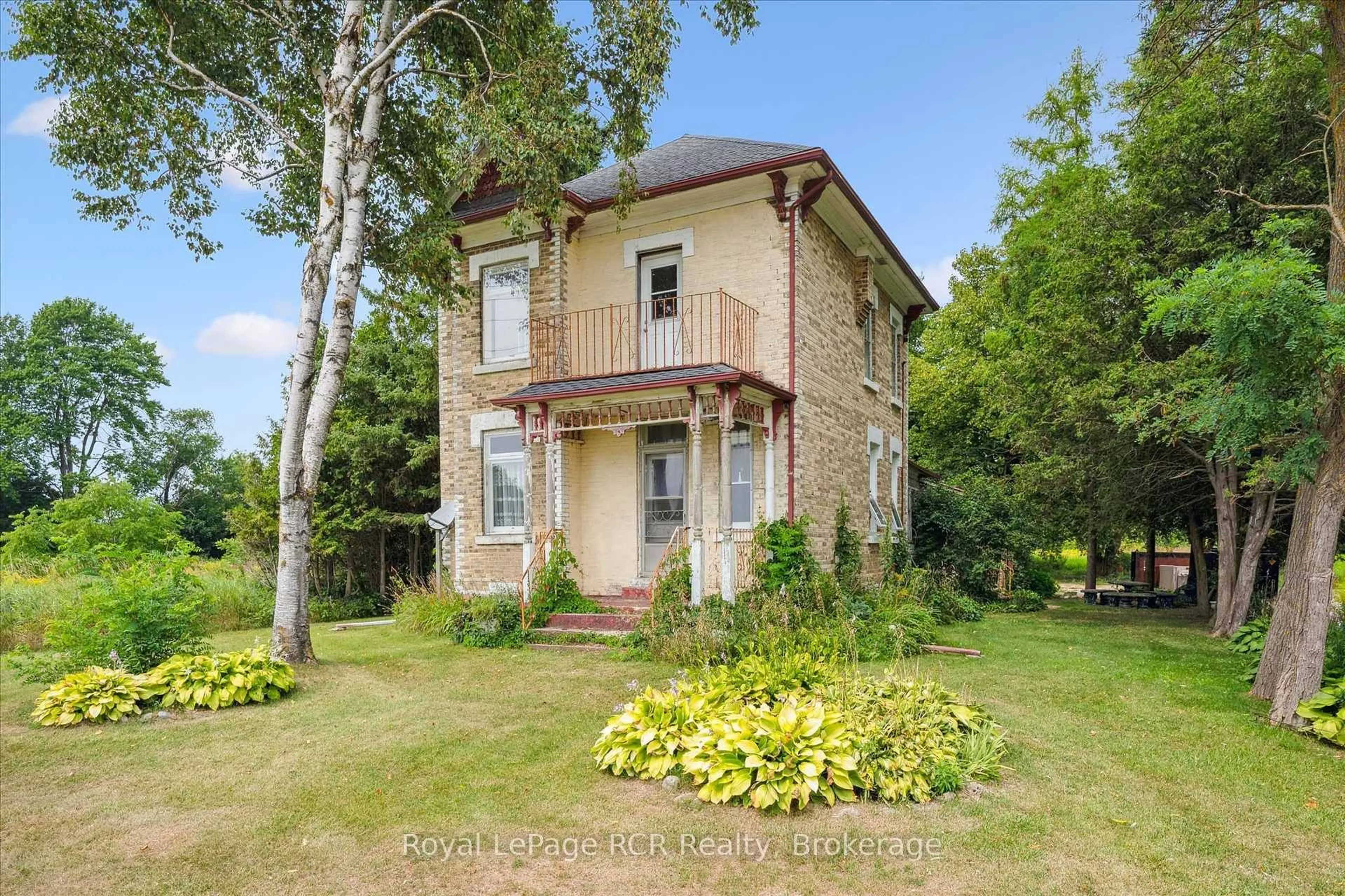 Home with brick exterior material, building for 311207 Highway Highway, Southgate Ontario N0G 2L0