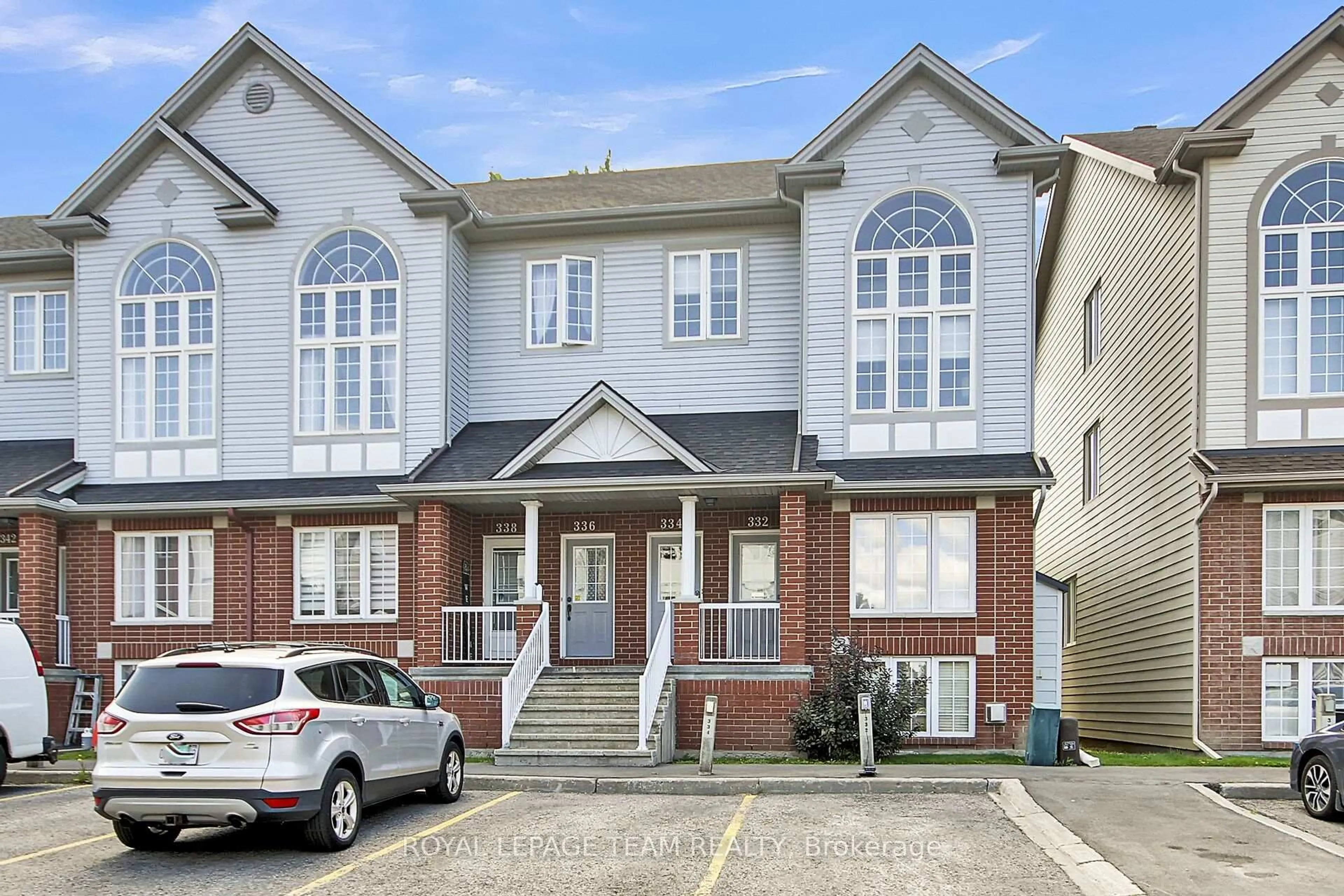 Home with brick exterior material, street for 334 Wiffen Private, Ottawa Ontario K2H 1G3