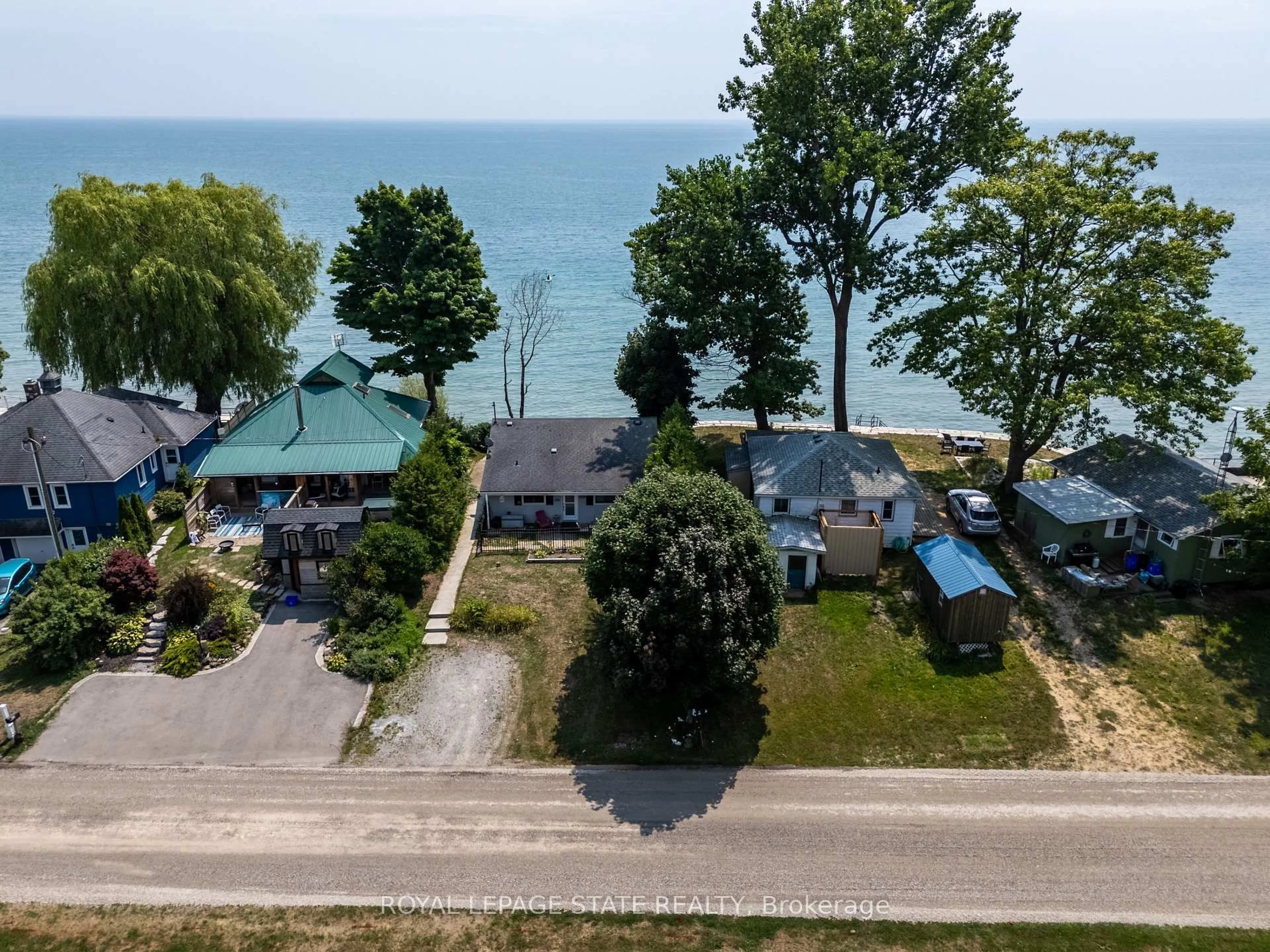 A pic from outside/outdoor area/front of a property/back of a property/a pic from drone, water/lake/river/ocean view for 2110 Lakeshore Rd, Haldimand Ontario N1A 2W8