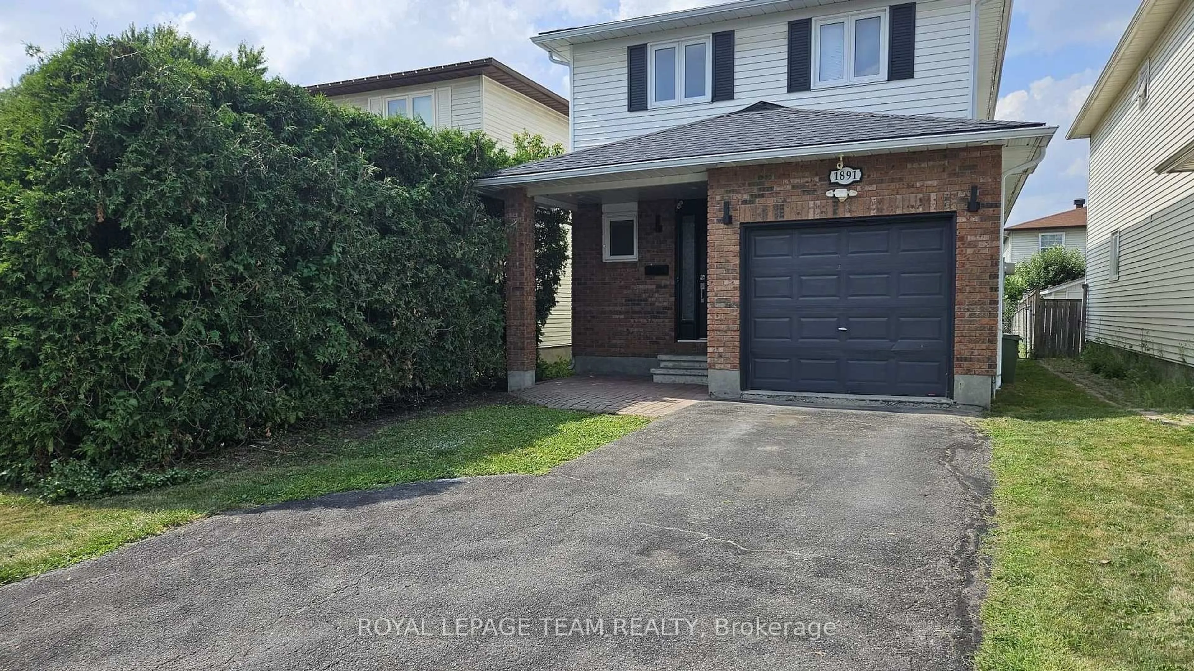 Home with brick exterior material, street for 1891 Longman Cres, Orleans Ontario K1C 5G8