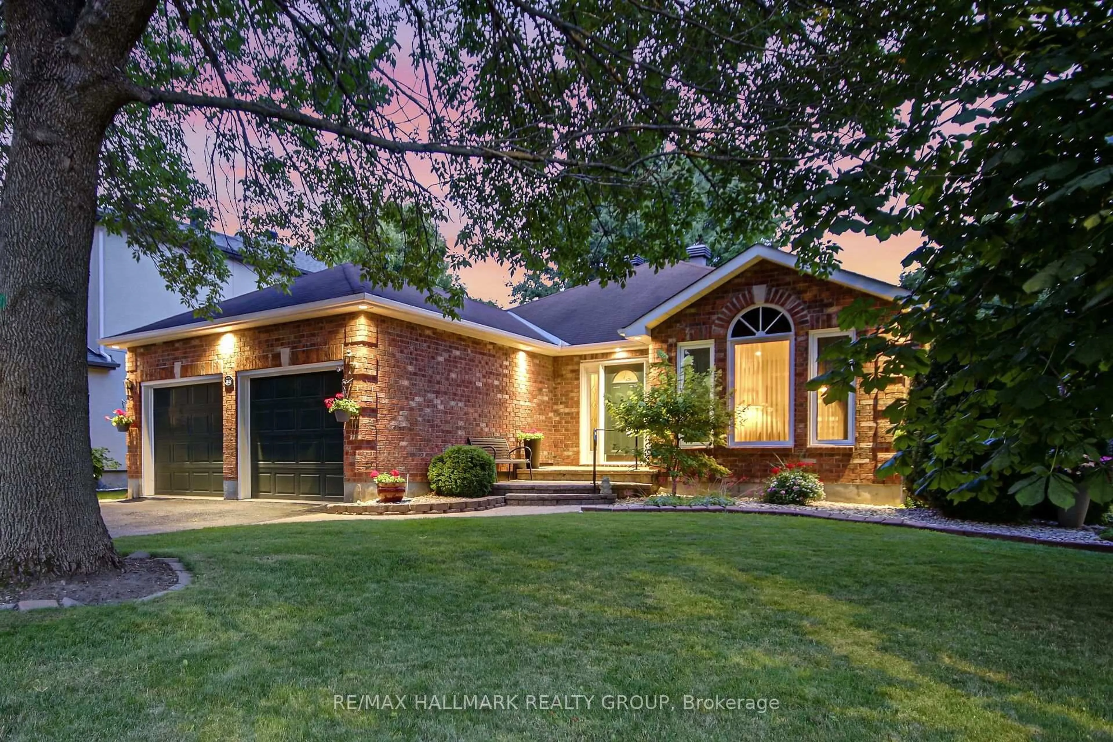 Home with brick exterior material, street for 30 Langford Cres, Ottawa Ontario K2K 2N5