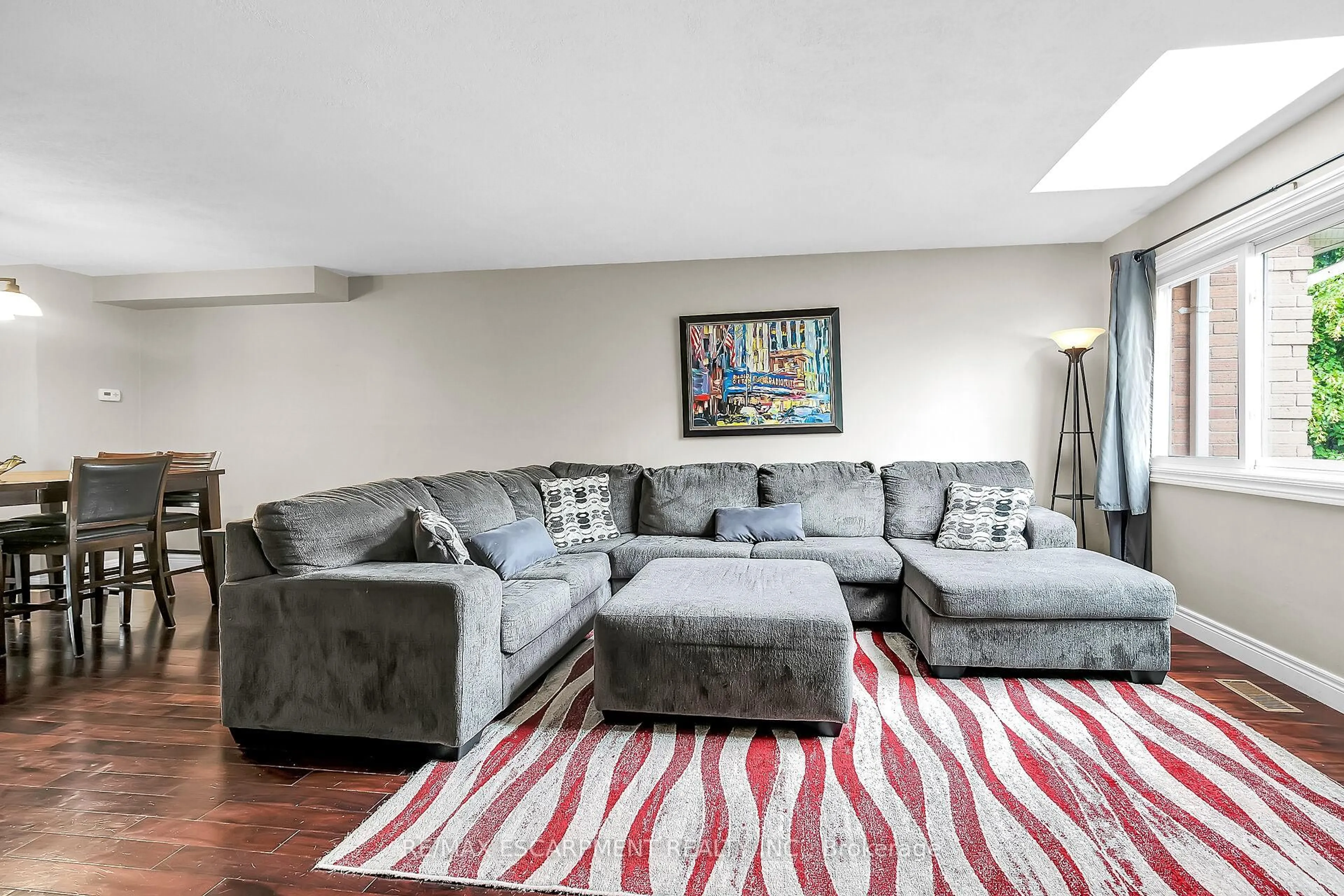 Living room with furniture, carpet floor for 26 Moss Blvd #24, Hamilton Ontario L9H 6W7