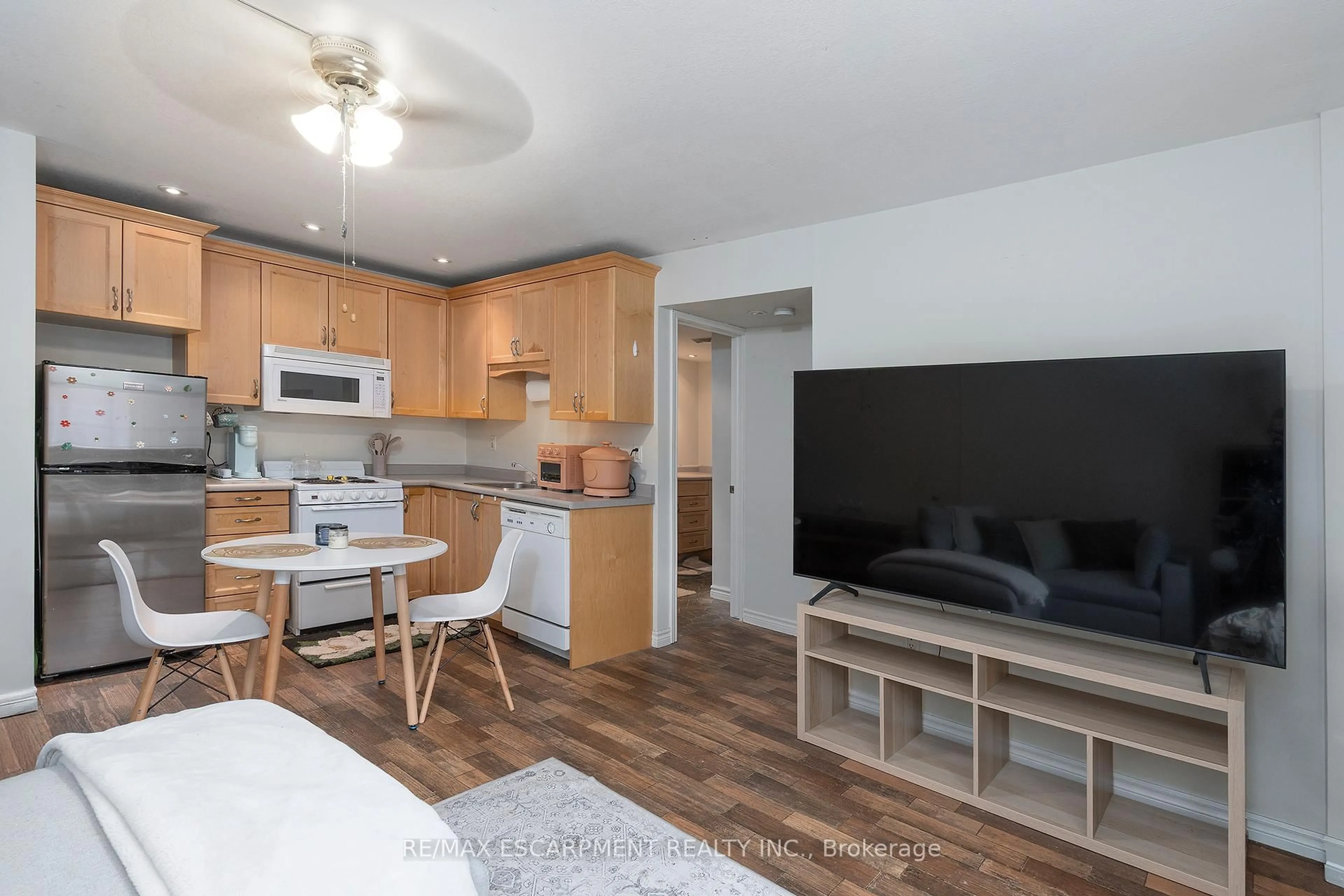 Open concept kitchen, wood/laminate floor for 1759 King St #14, Hamilton Ontario L8K 1V6