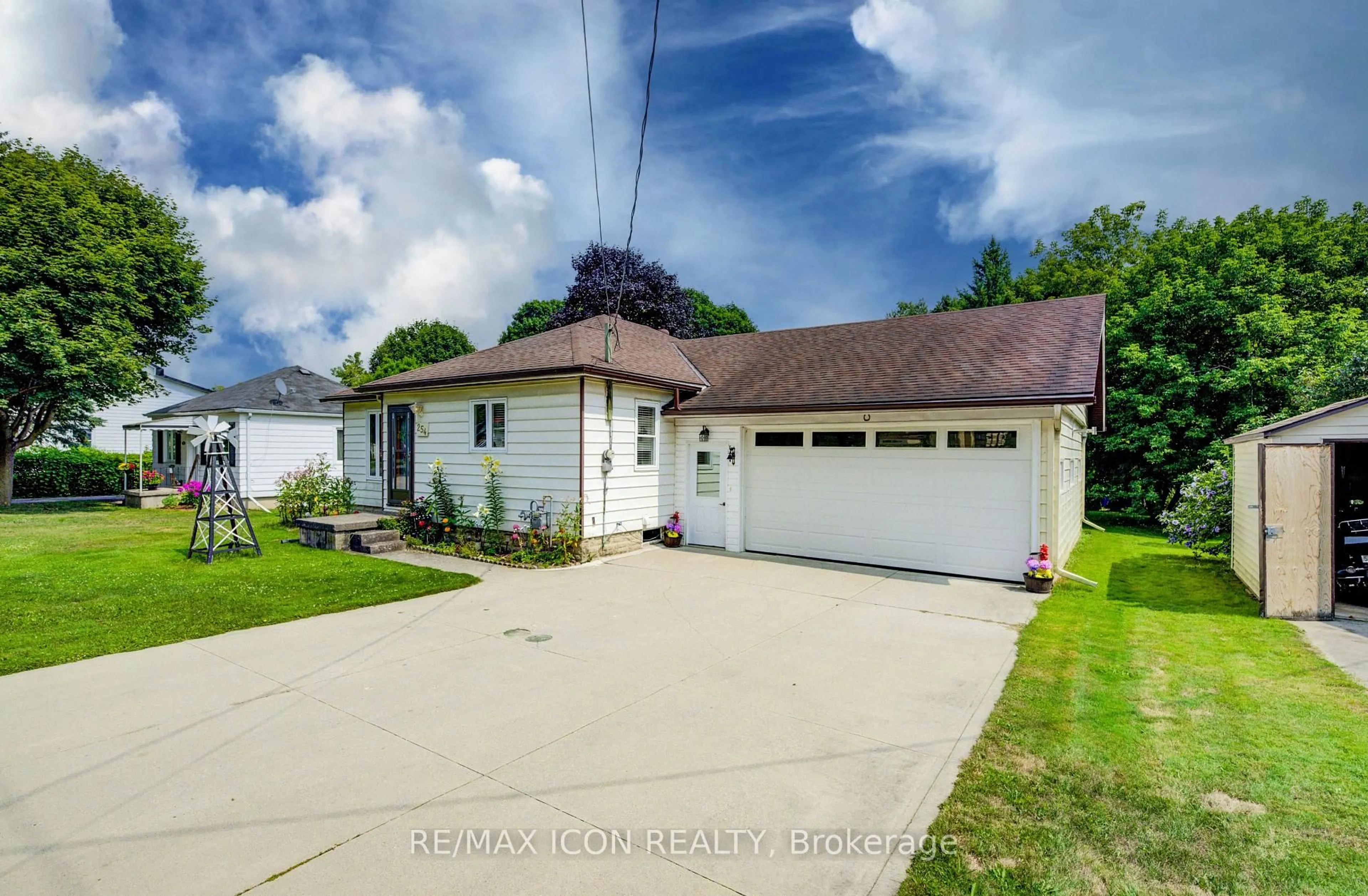 A pic from outside/outdoor area/front of a property/back of a property/a pic from drone, street for 254 Wellington St, Wellington North Ontario N0G 2L0