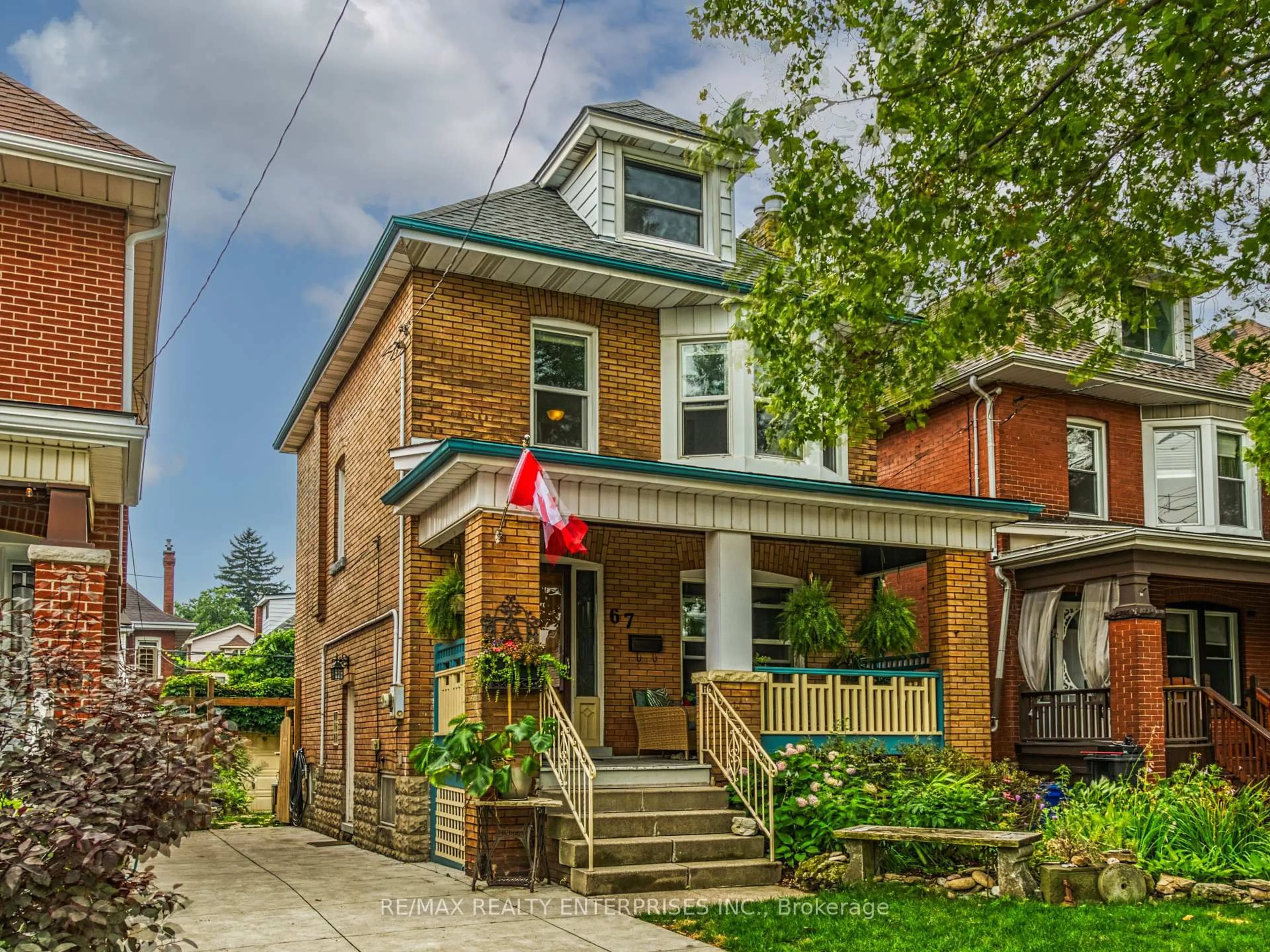 Home with brick exterior material, street for 67 Kensington Ave, Hamilton Ontario L8M 3H1
