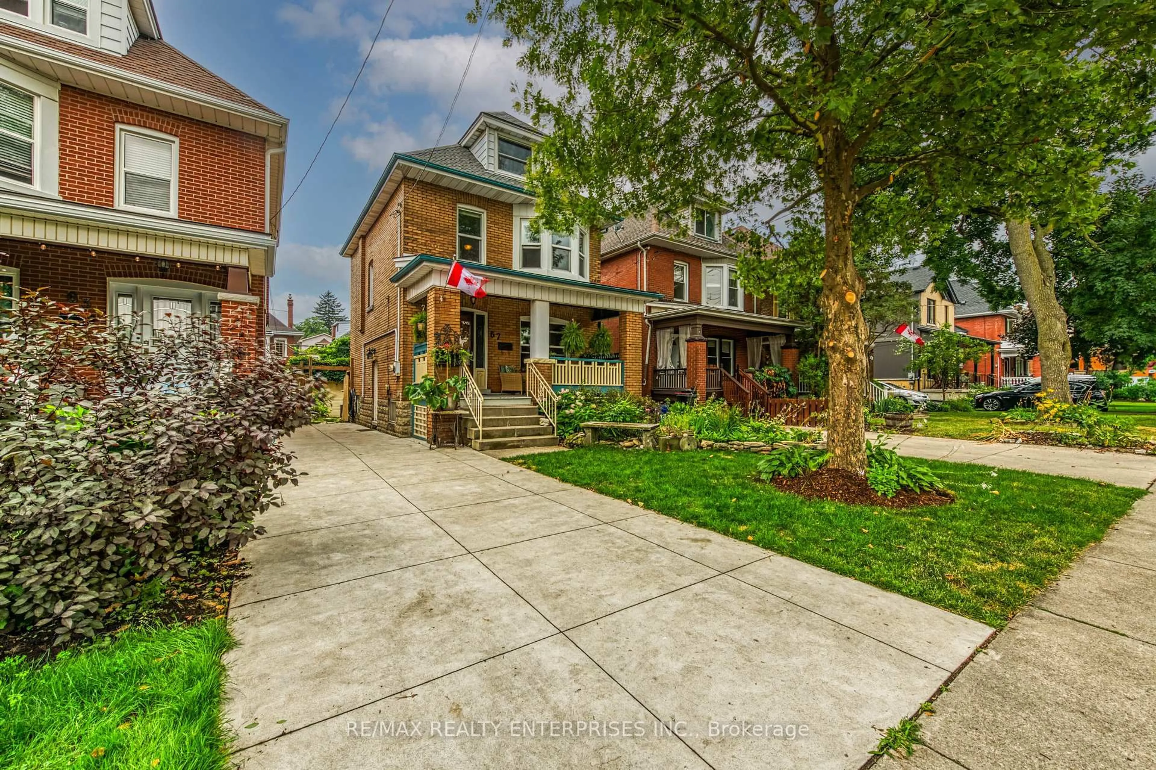 Home with brick exterior material, street for 67 Kensington Ave, Hamilton Ontario L8M 3H1