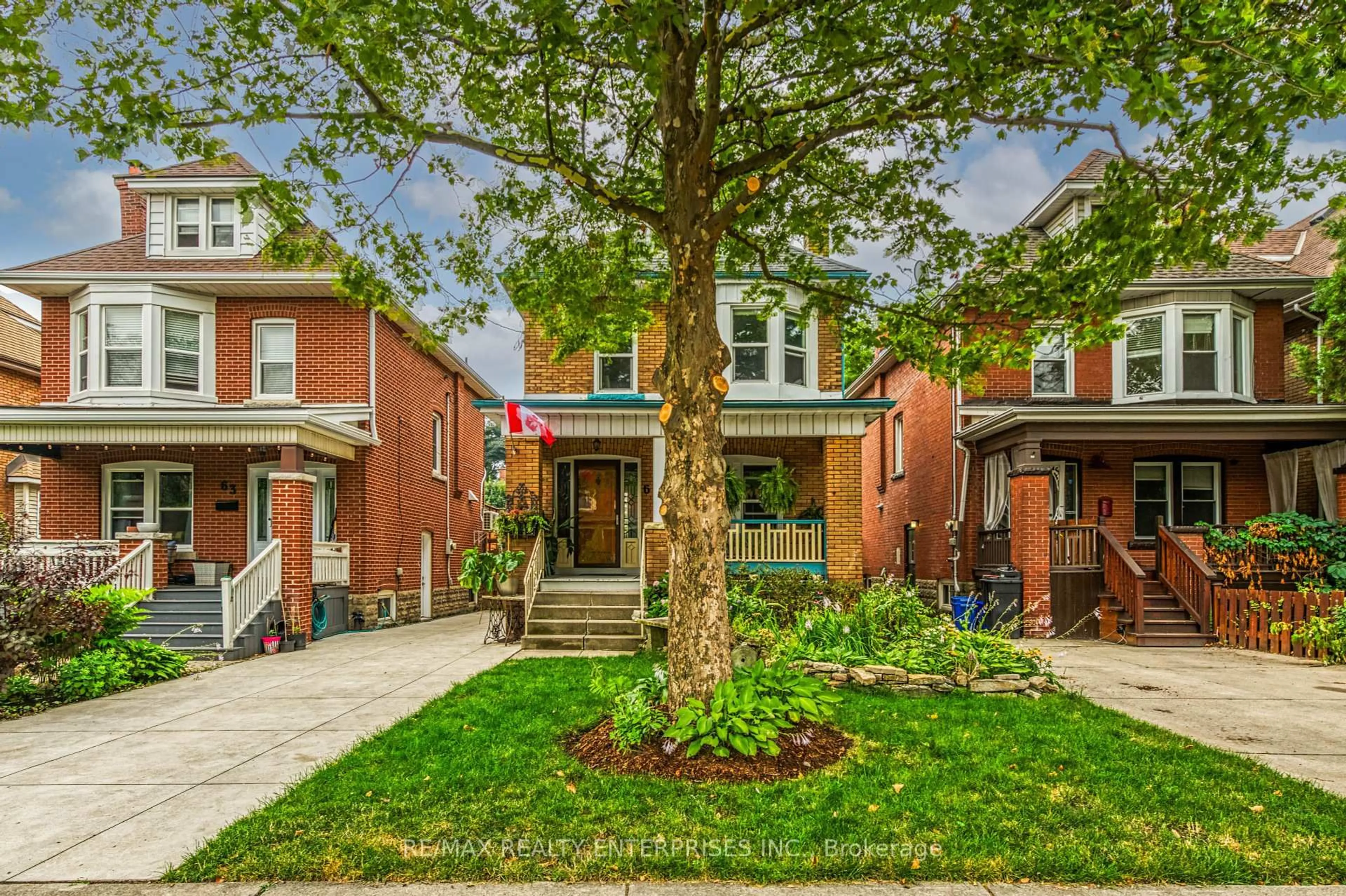 Home with brick exterior material, street for 67 Kensington Ave, Hamilton Ontario L8M 3H1