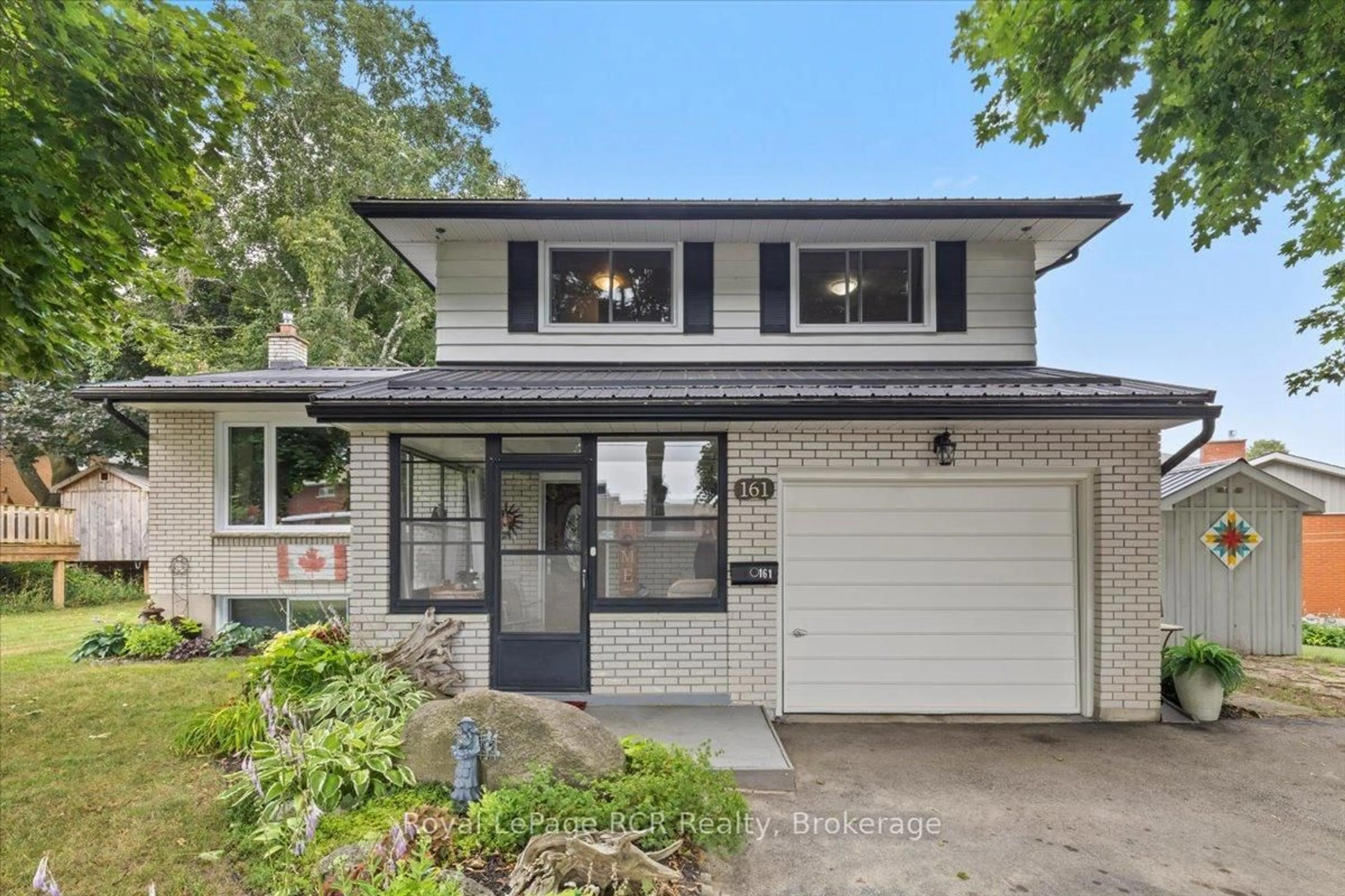 Home with vinyl exterior material, street for 161 6th St, Hanover Ontario N4N 1B9