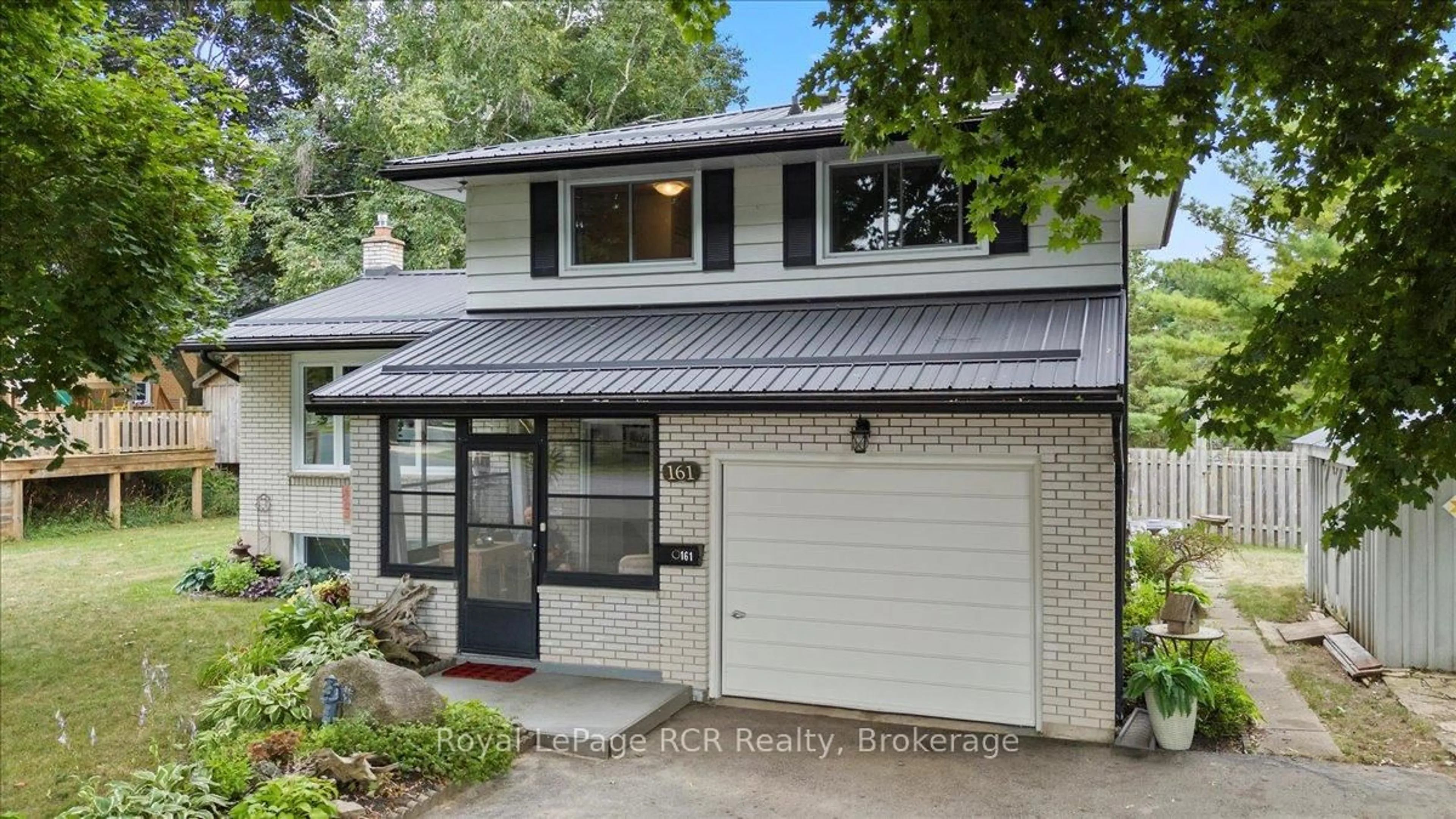 Home with vinyl exterior material, street for 161 6th St, Hanover Ontario N4N 1B9