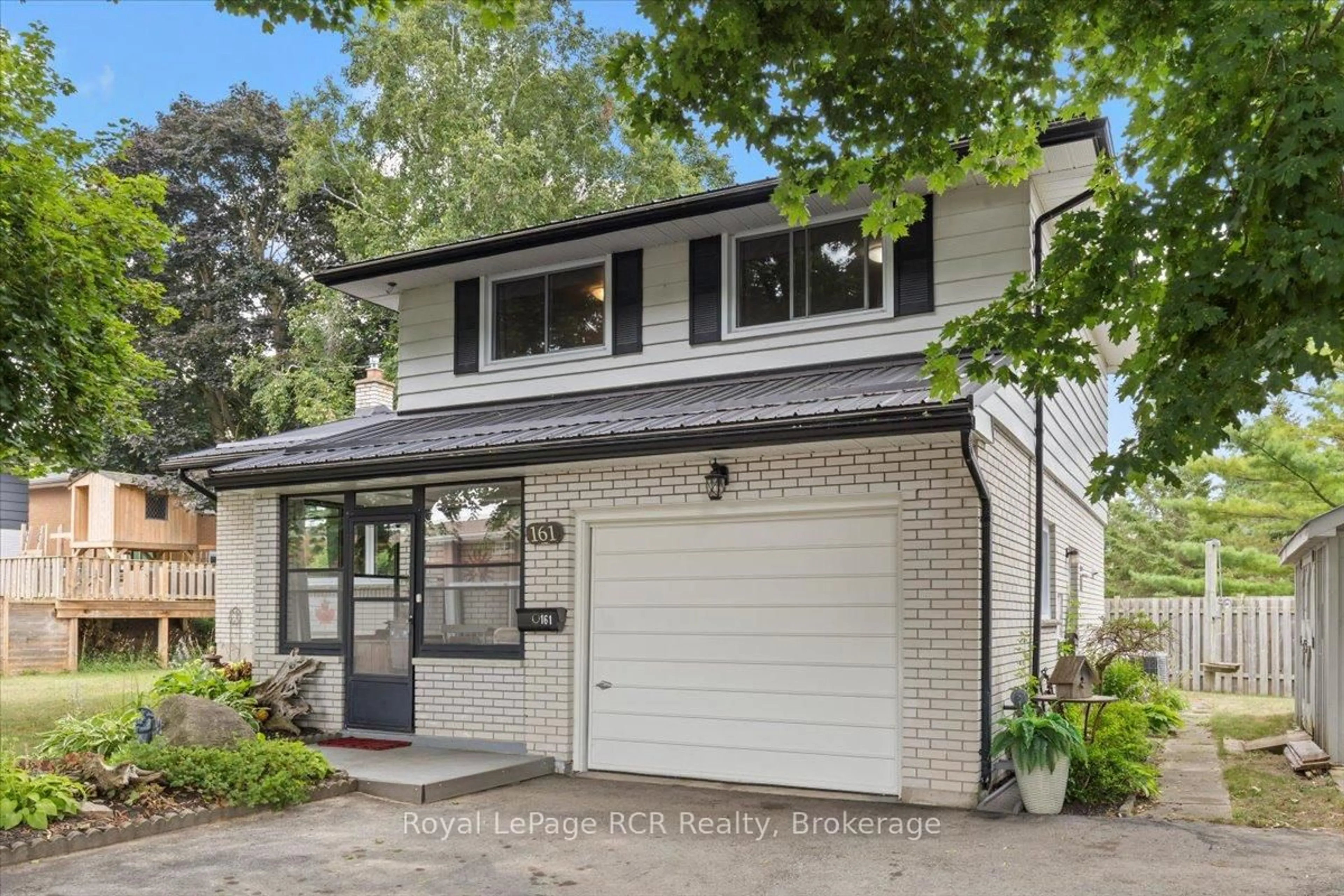 Home with brick exterior material, street for 161 6th St, Hanover Ontario N4N 1B9