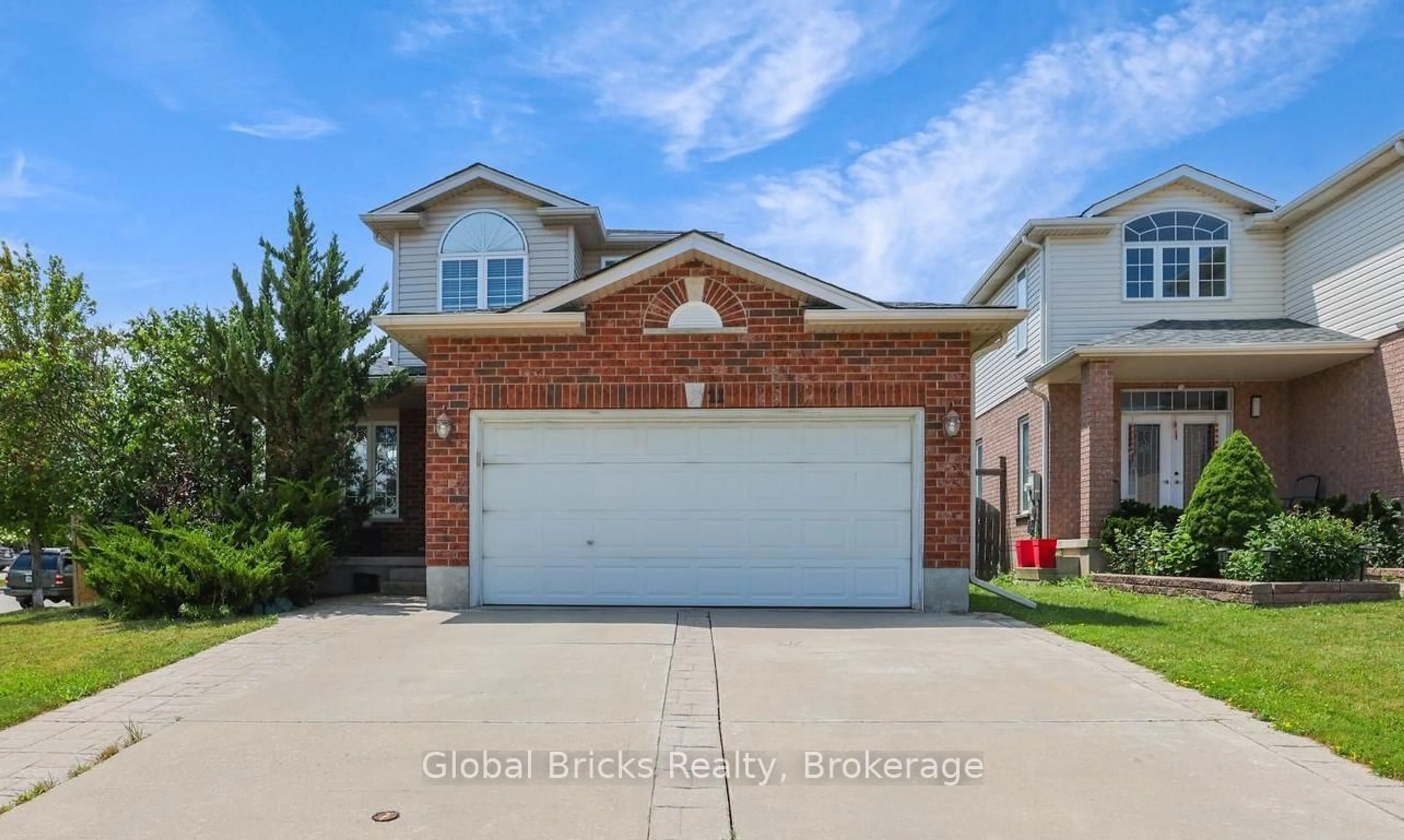 Home with brick exterior material, street for 11 Pebblecreek Dr, Kitchener Ontario N2A 4J8