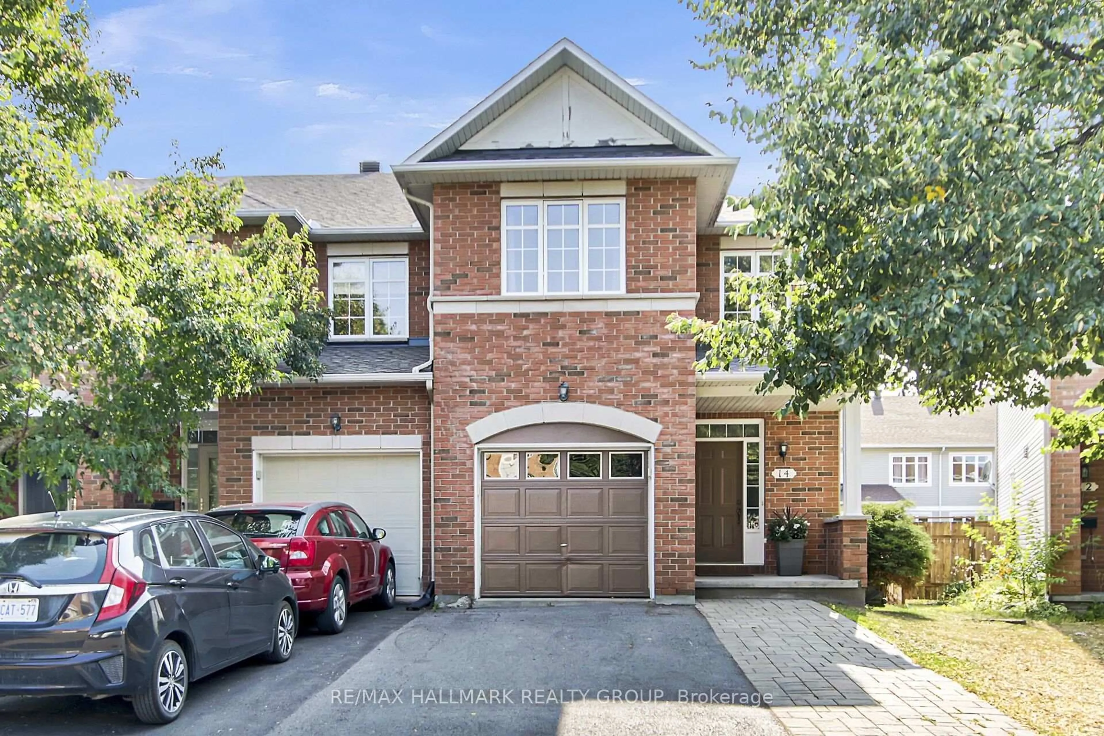 Home with brick exterior material, street for 14 Plumas Gate, Ottawa Ontario K2J 5C3