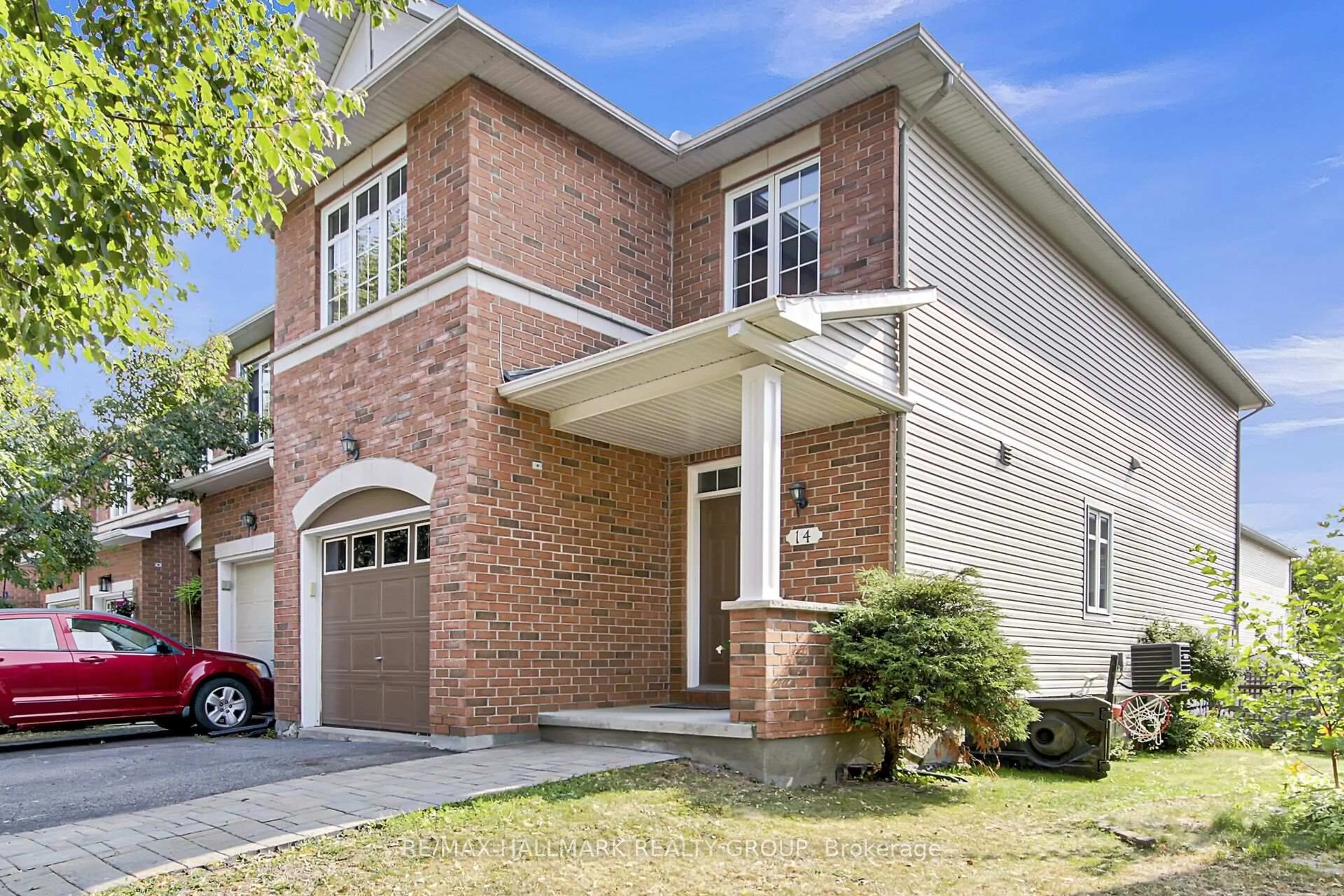 Home with brick exterior material, street for 14 Plumas Gate, Ottawa Ontario K2J 5C3