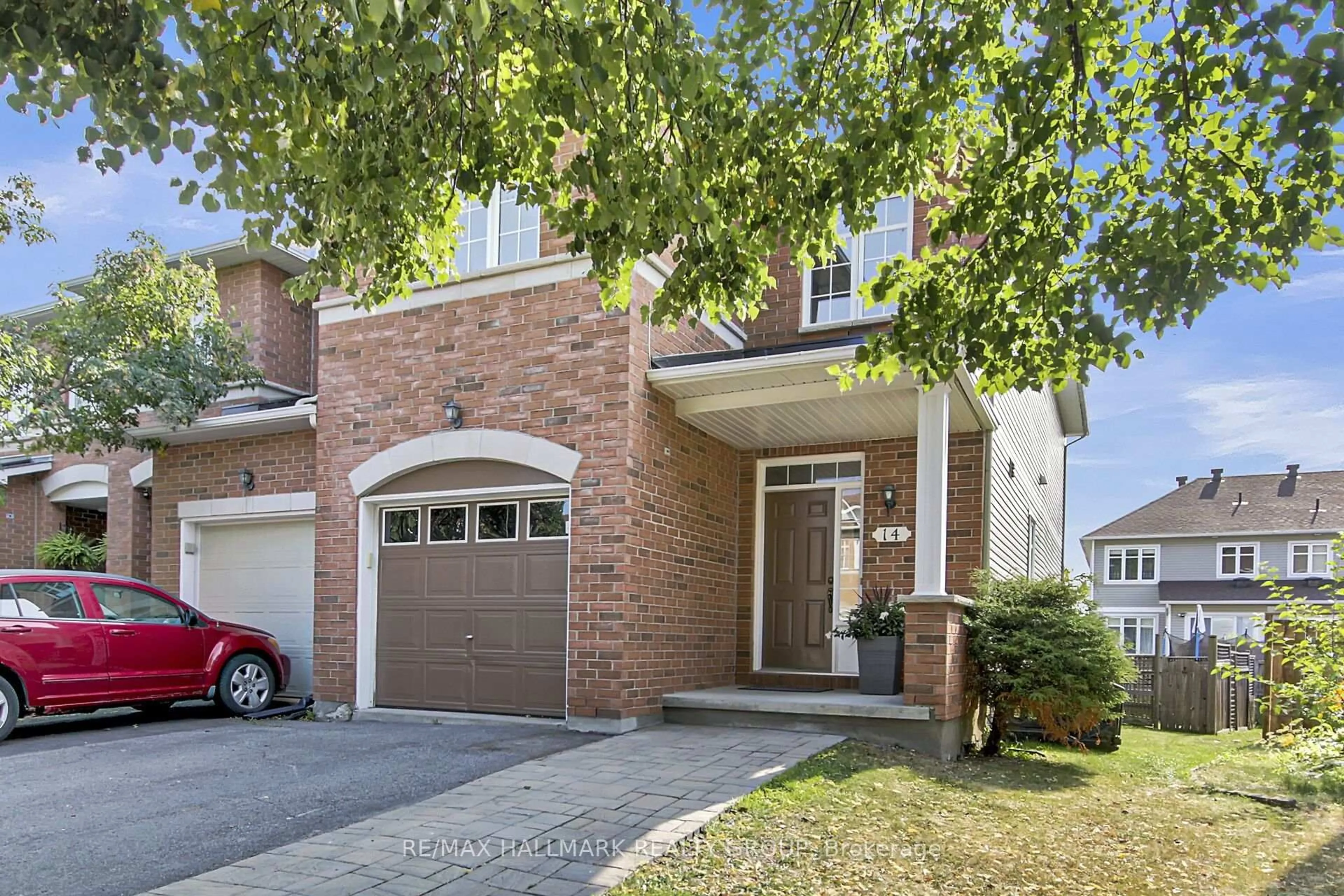 Home with brick exterior material, street for 14 Plumas Gate, Ottawa Ontario K2J 5C3