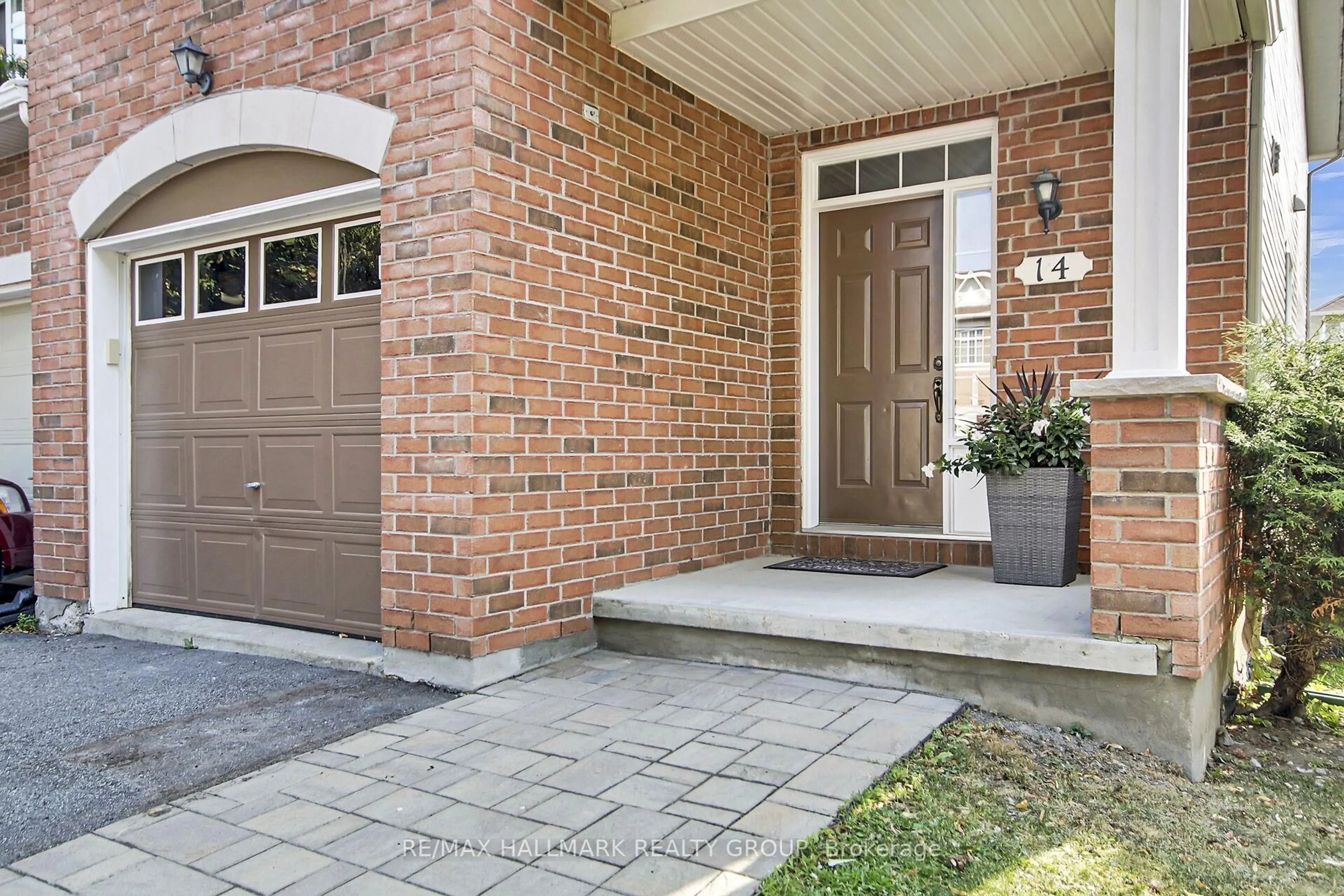 Home with brick exterior material, street for 14 Plumas Gate, Ottawa Ontario K2J 5C3
