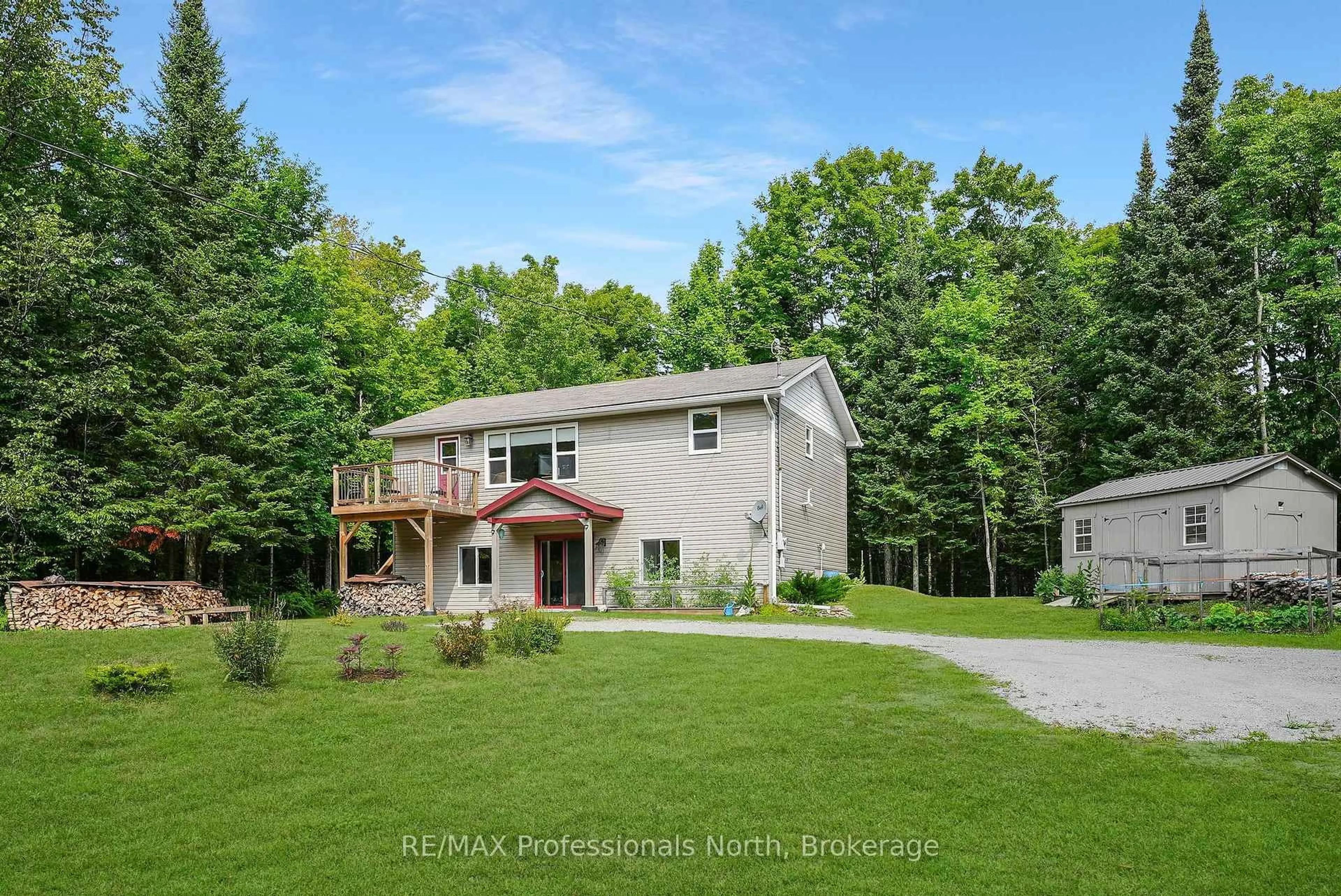 A pic from outside/outdoor area/front of a property/back of a property/a pic from drone, unknown for 1453 Minnicock Lake Rd, Dysart et al Ontario K0M 1S0