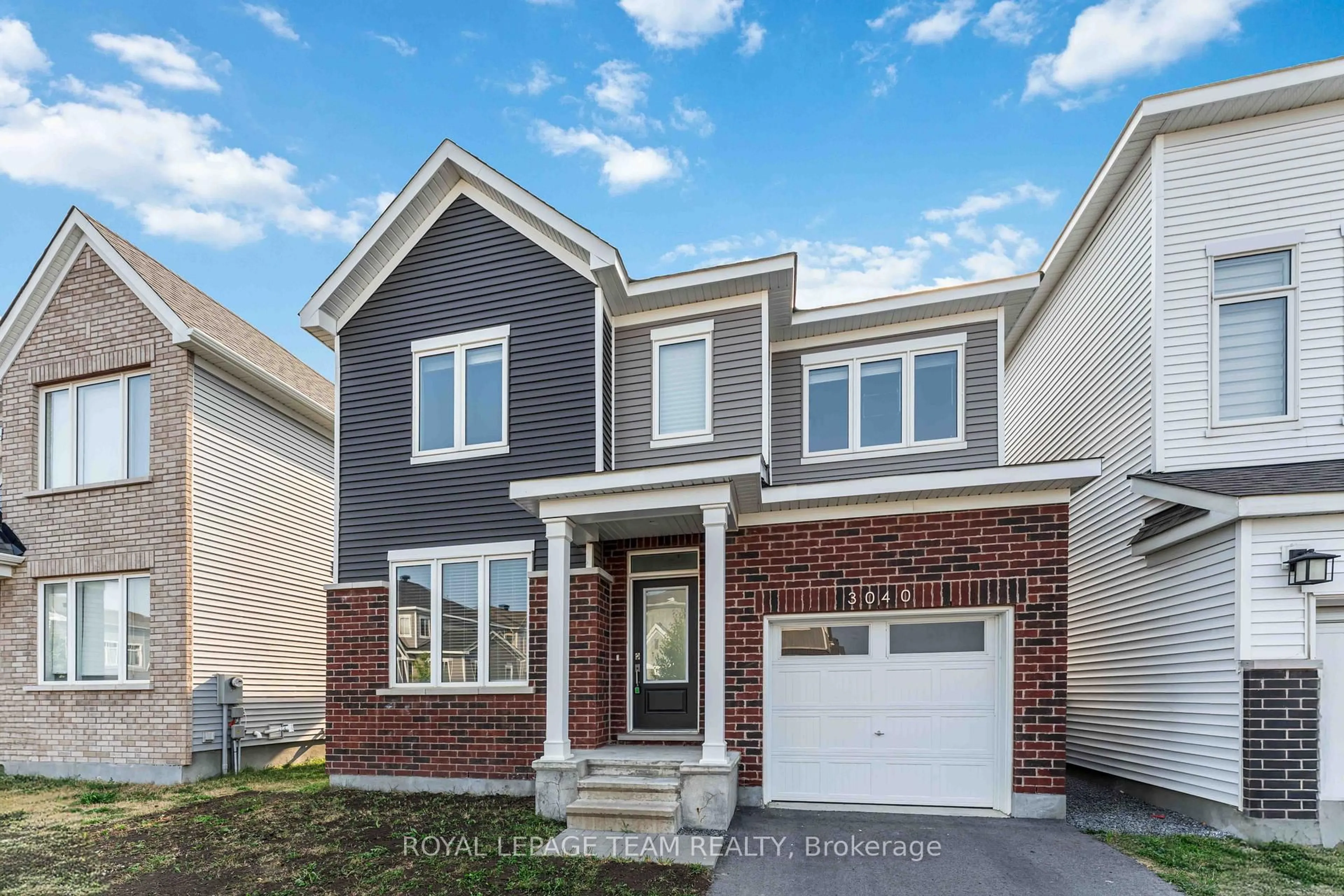 Home with brick exterior material, street for 3040 Travertine Way, Ottawa Ontario K2J 6W9