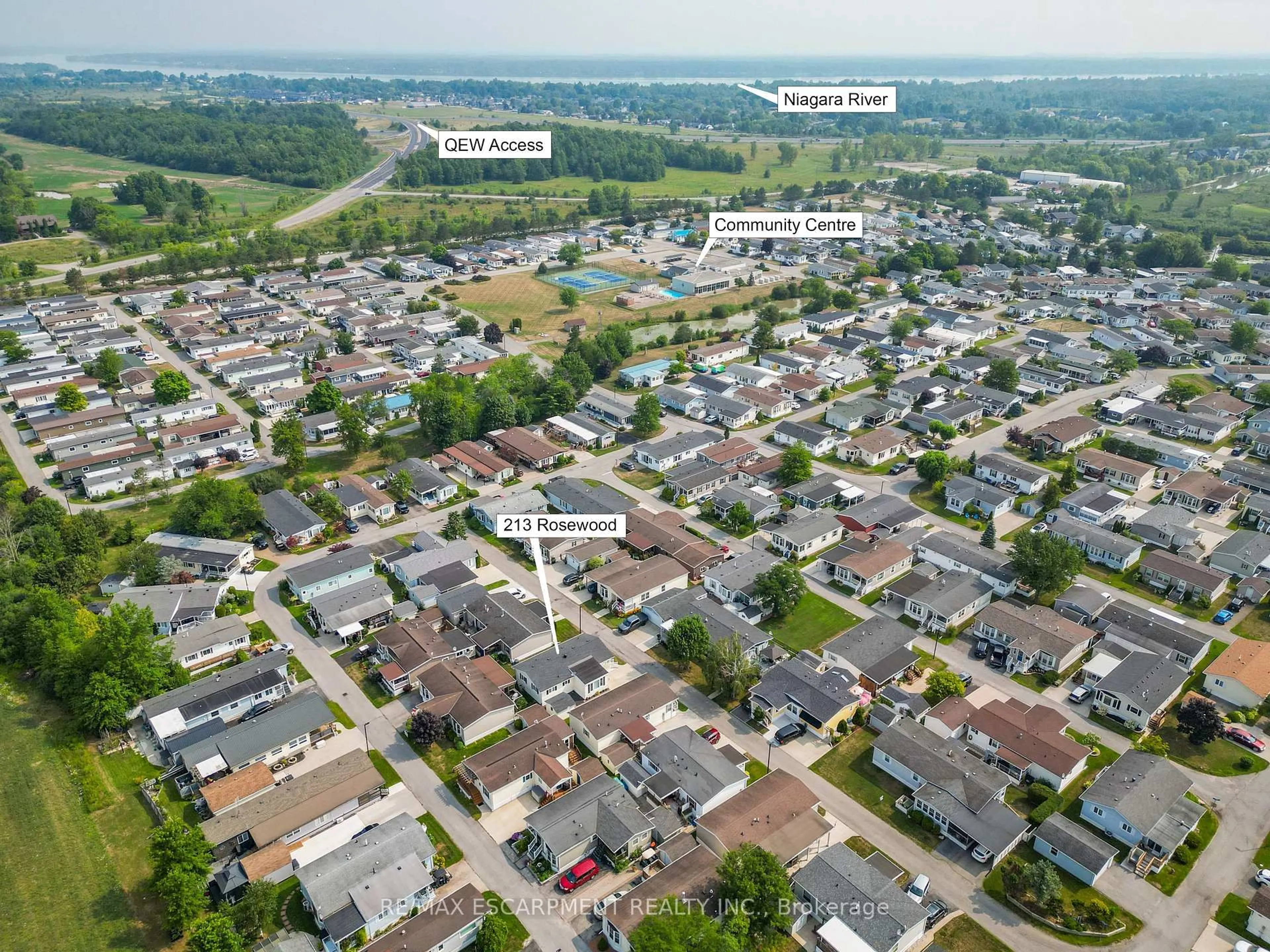 A pic from outside/outdoor area/front of a property/back of a property/a pic from drone, street for 3033 Townline Rd #213, Fort Erie Ontario L0S 1S1