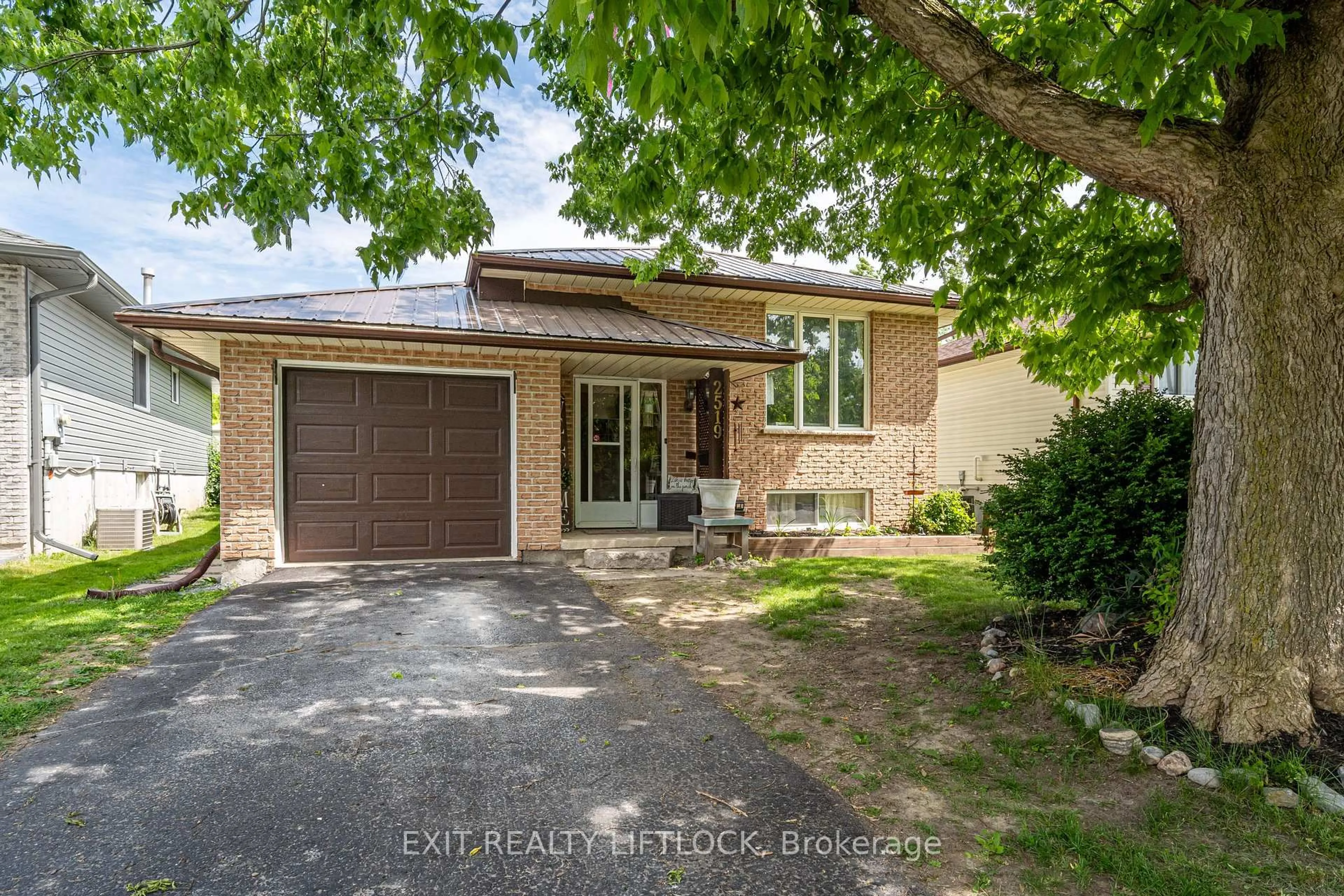 Home with brick exterior material, street for 2519 Foxmeadow Rd, Peterborough East Ontario K9L 1X2