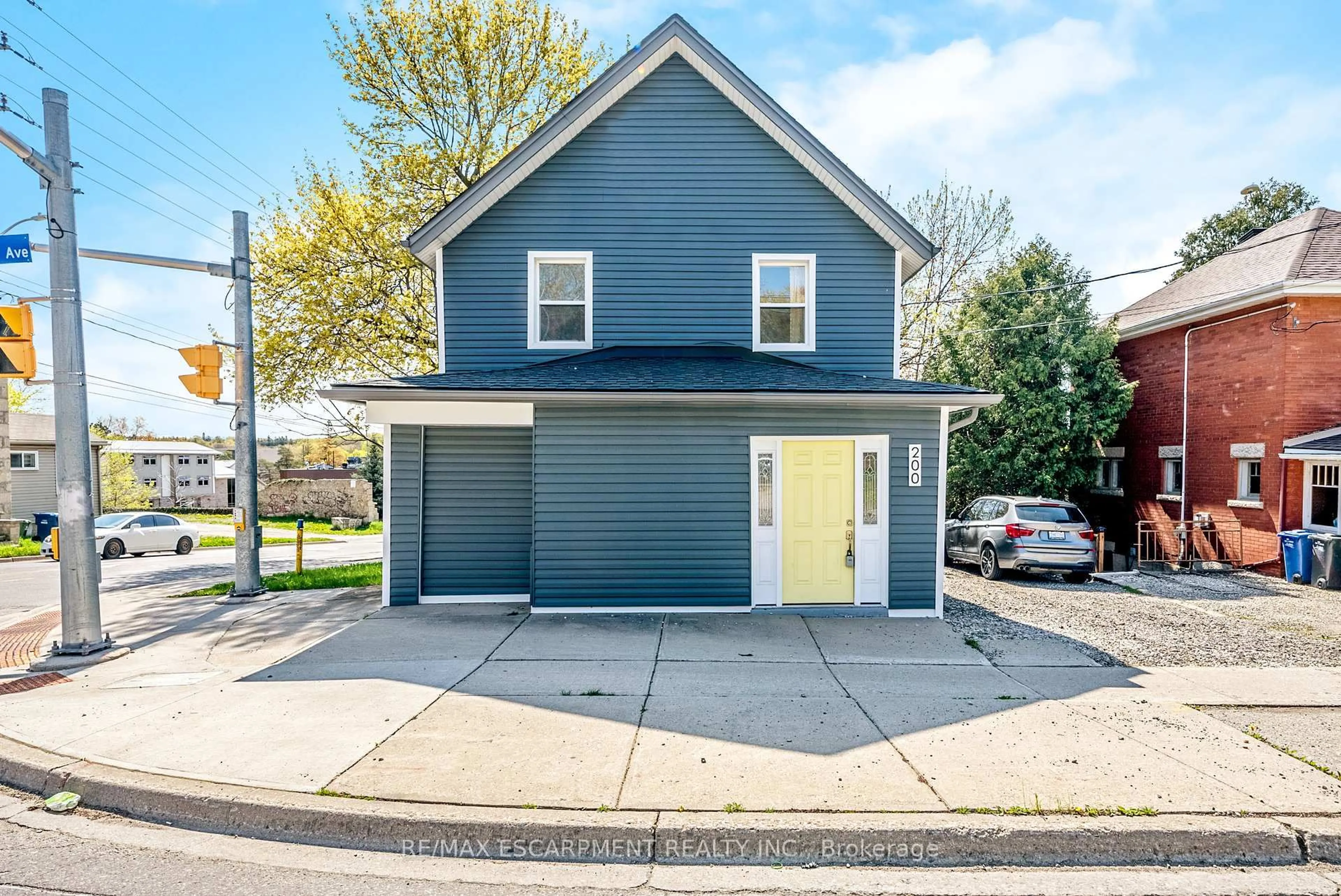 Home with vinyl exterior material, street for 200 Waterloo Ave, Guelph Ontario N1H 3J5