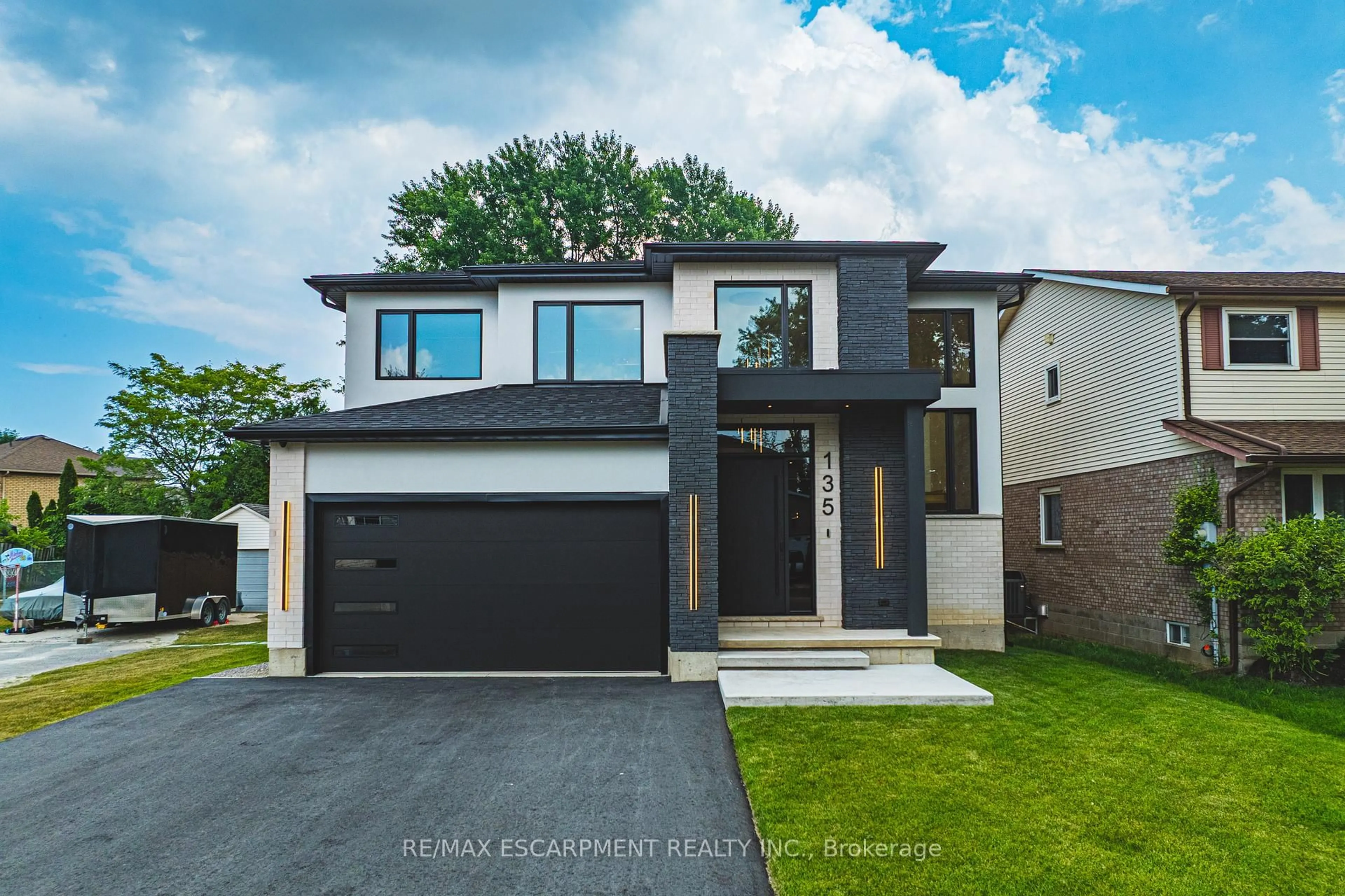 Home with brick exterior material, street for 135 Eleanor Ave, Hamilton Ontario L8W 1C7