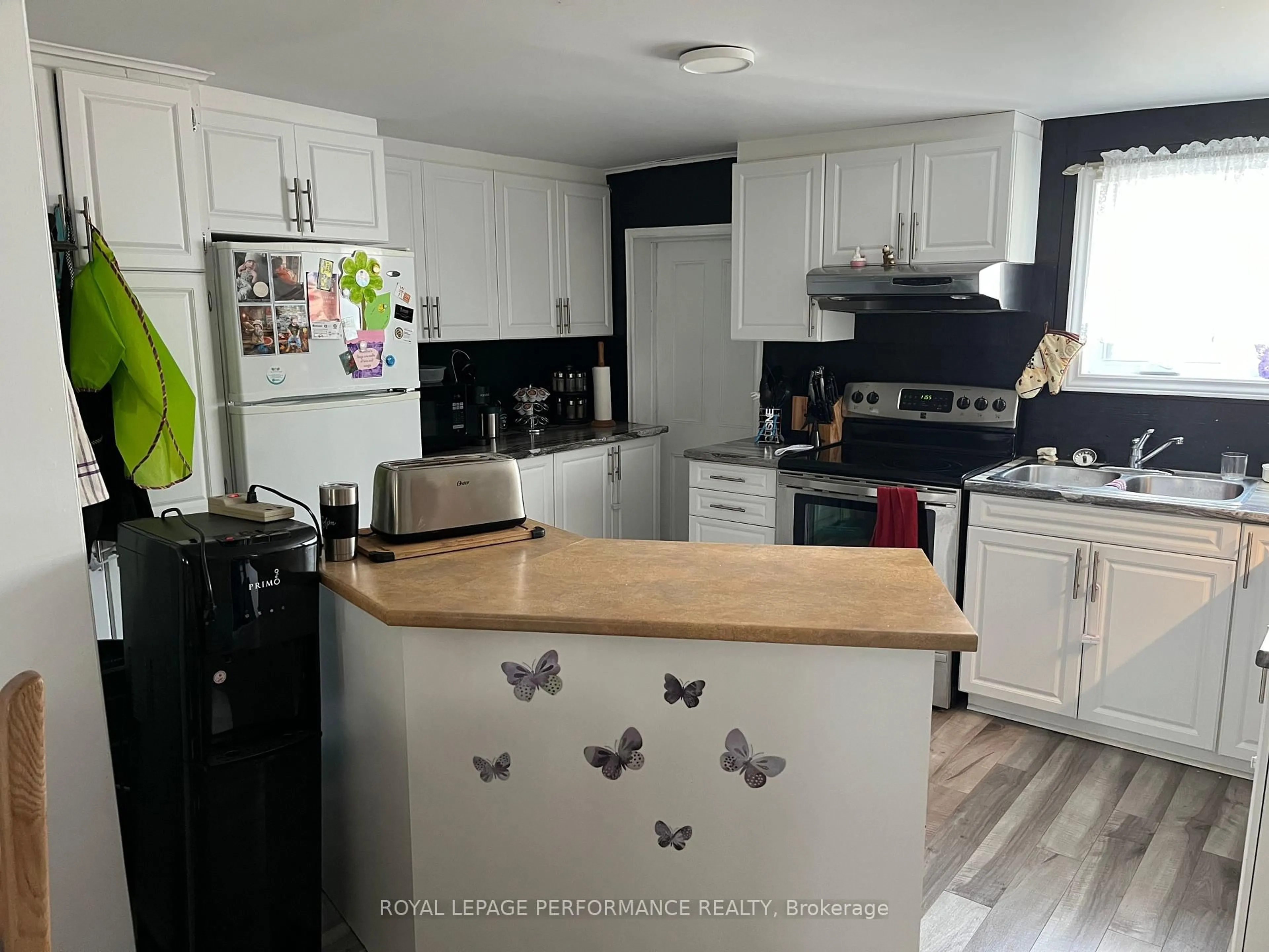 Open concept kitchen, wood/laminate floor for 244 Laurier St, Hawkesbury Ontario K6A 2A1