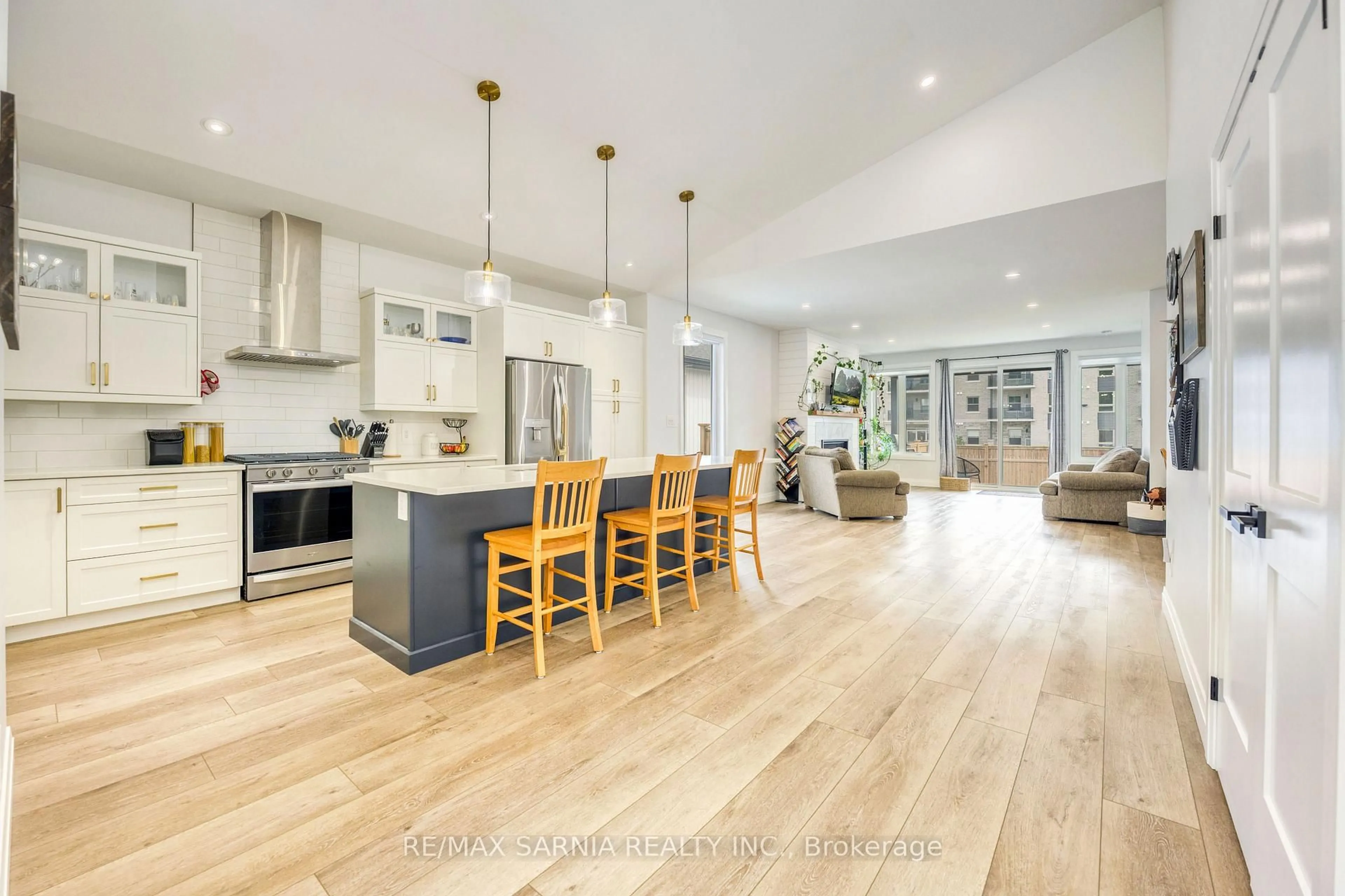 Open concept kitchen, wood/laminate floor for 203 Essex St, Sarnia Ontario N7T 0C2