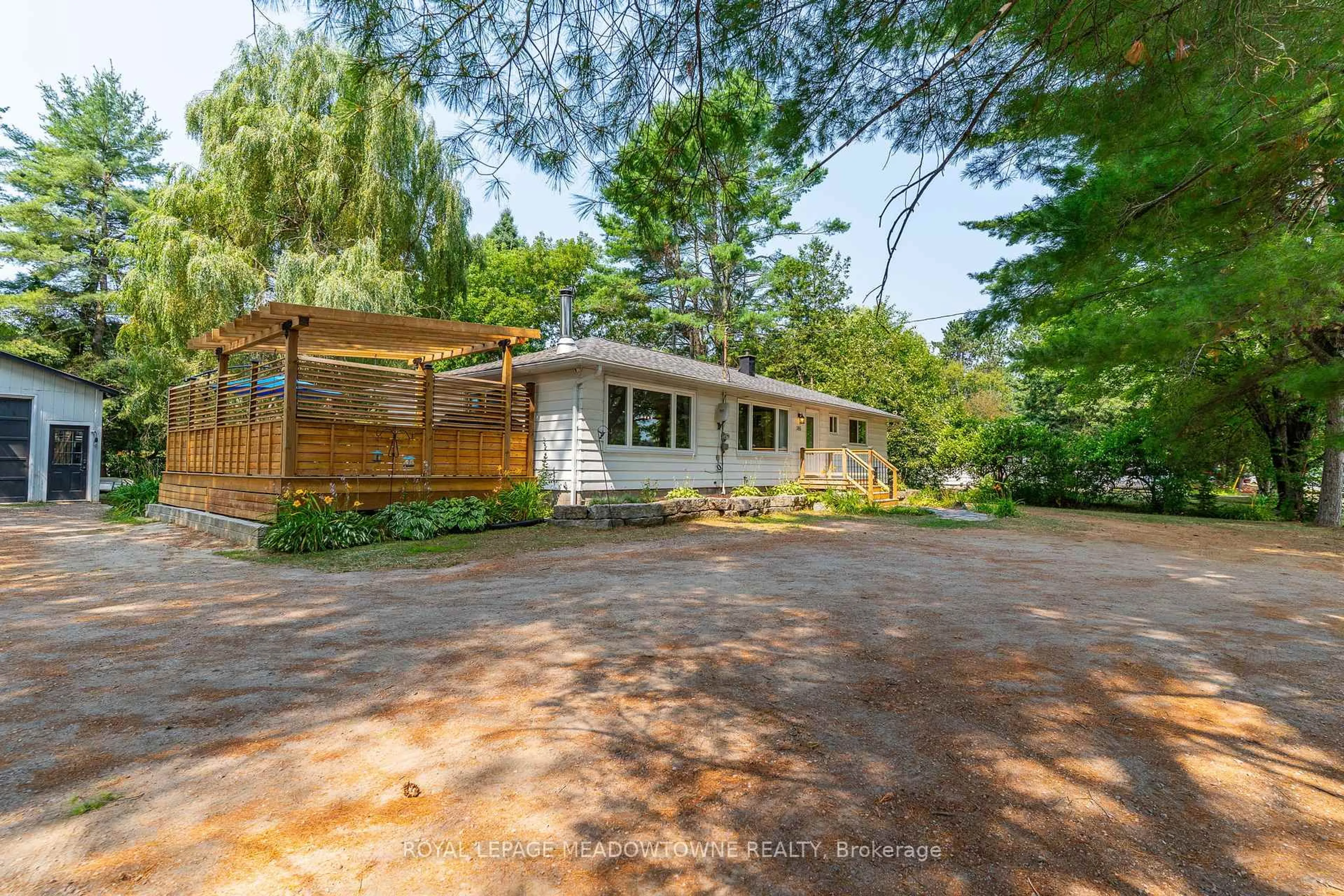 A pic from outside/outdoor area/front of a property/back of a property/a pic from drone, unknown for 185 Bobcaygeon Rd, Minden Hills Ontario K0M 2K0