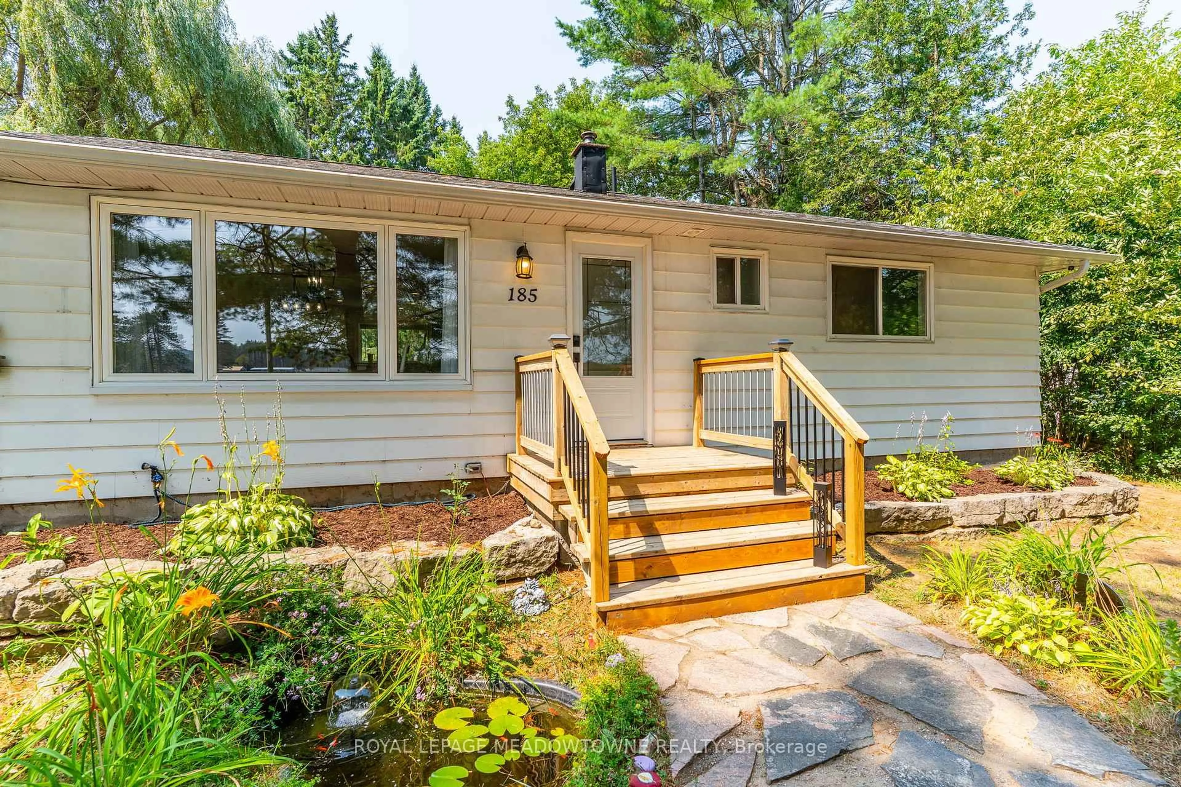Home with vinyl exterior material, street for 185 Bobcaygeon Rd, Minden Hills Ontario K0M 2K0