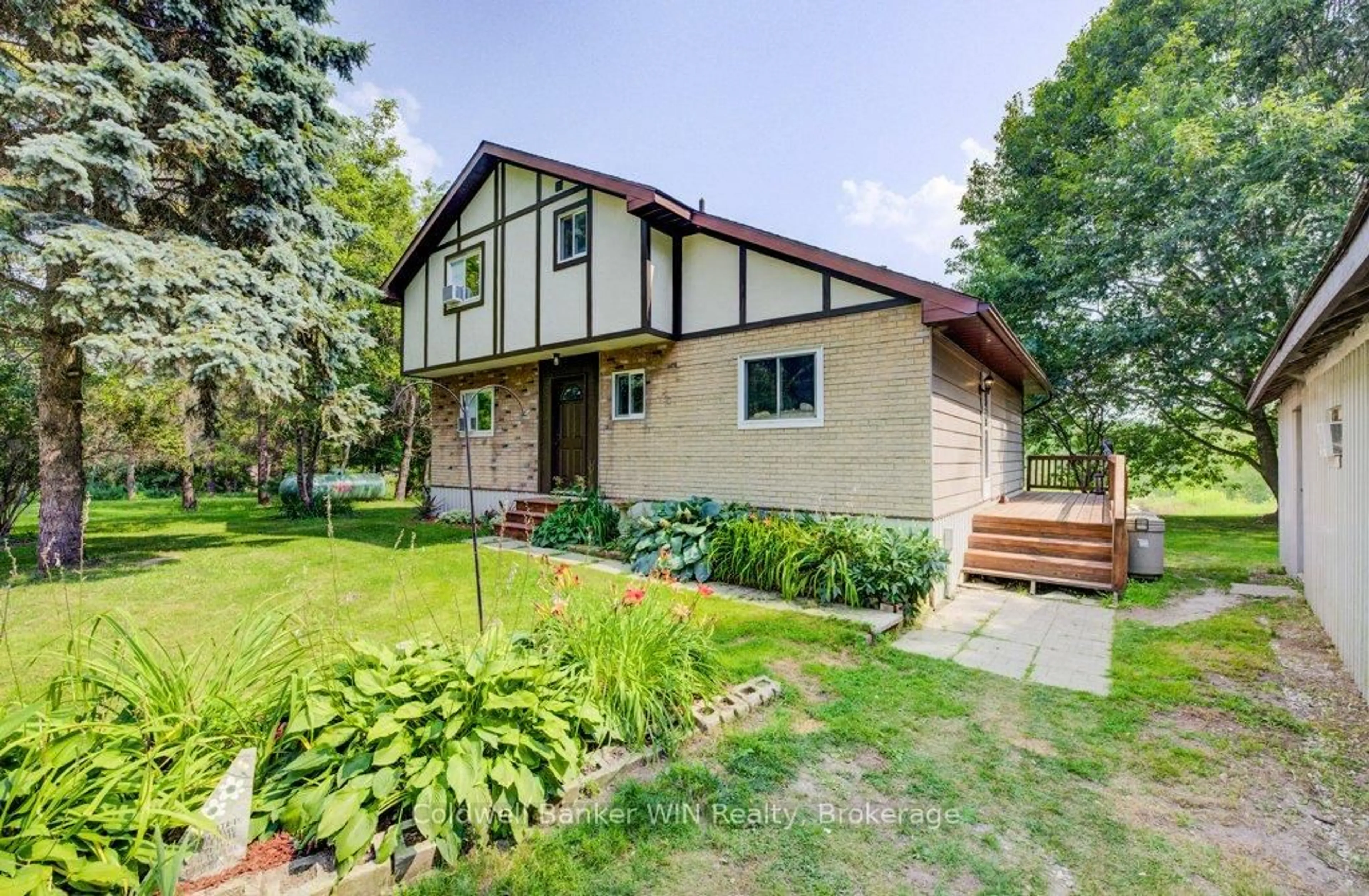 Home with brick exterior material, street for 7589 89 Highway, Wellington North Ontario N0G 2L0