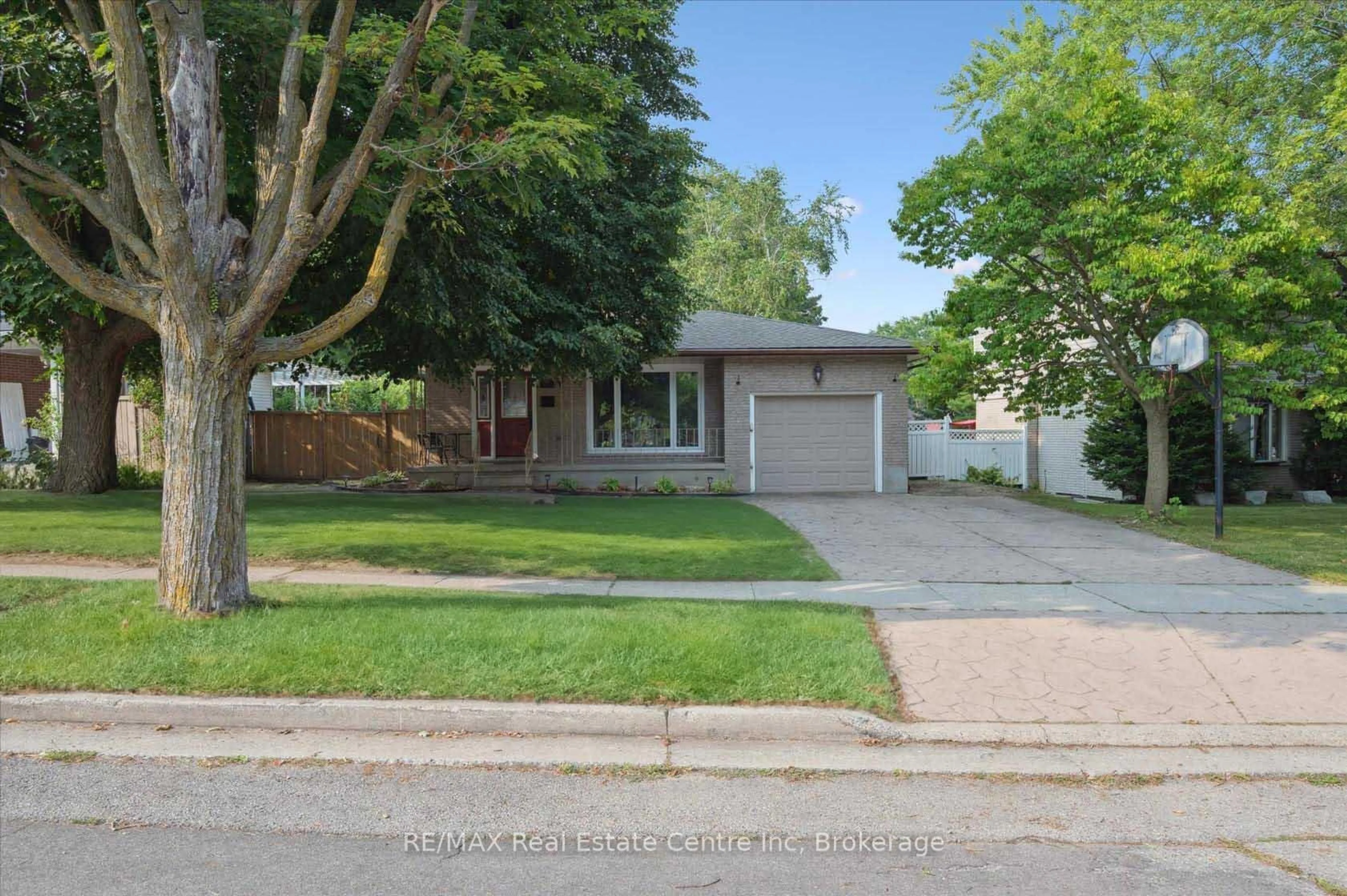 Home with vinyl exterior material, street for 69 Rhonda Rd, Guelph Ontario N1H 6H3