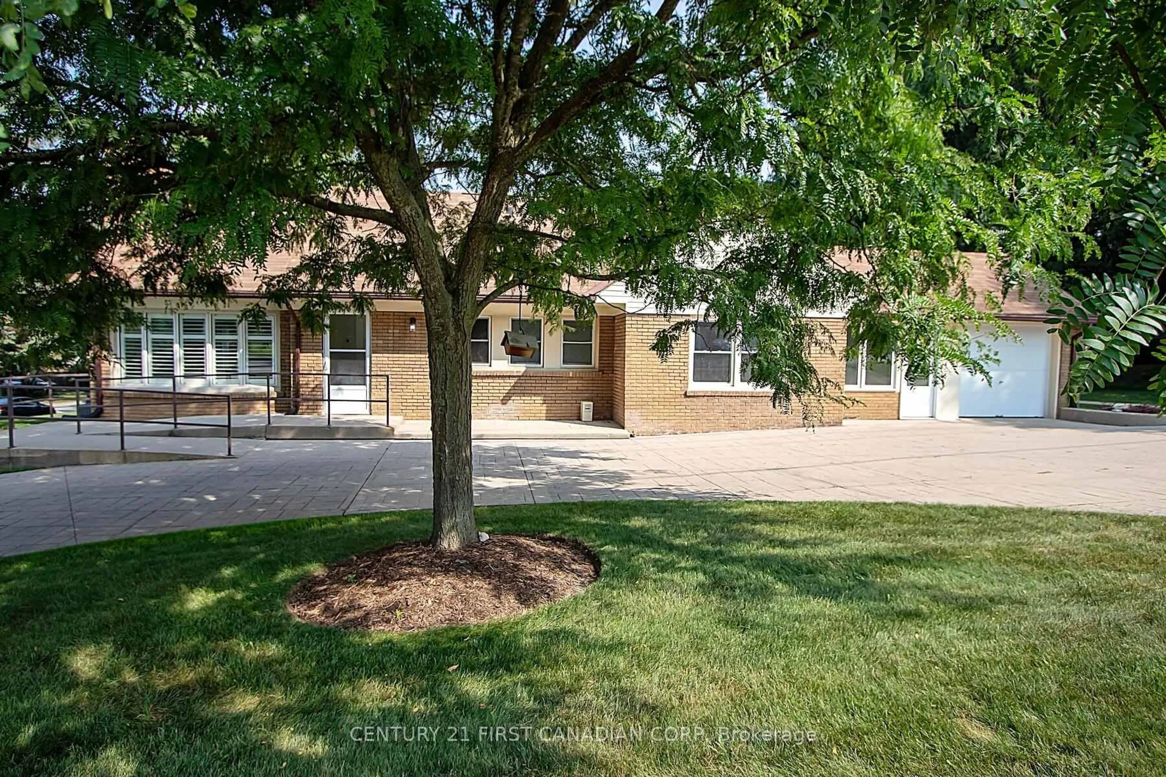 A pic from outside/outdoor area/front of a property/back of a property/a pic from drone, street for 459 Riverside Dr, London North Ontario N5V 4Y8