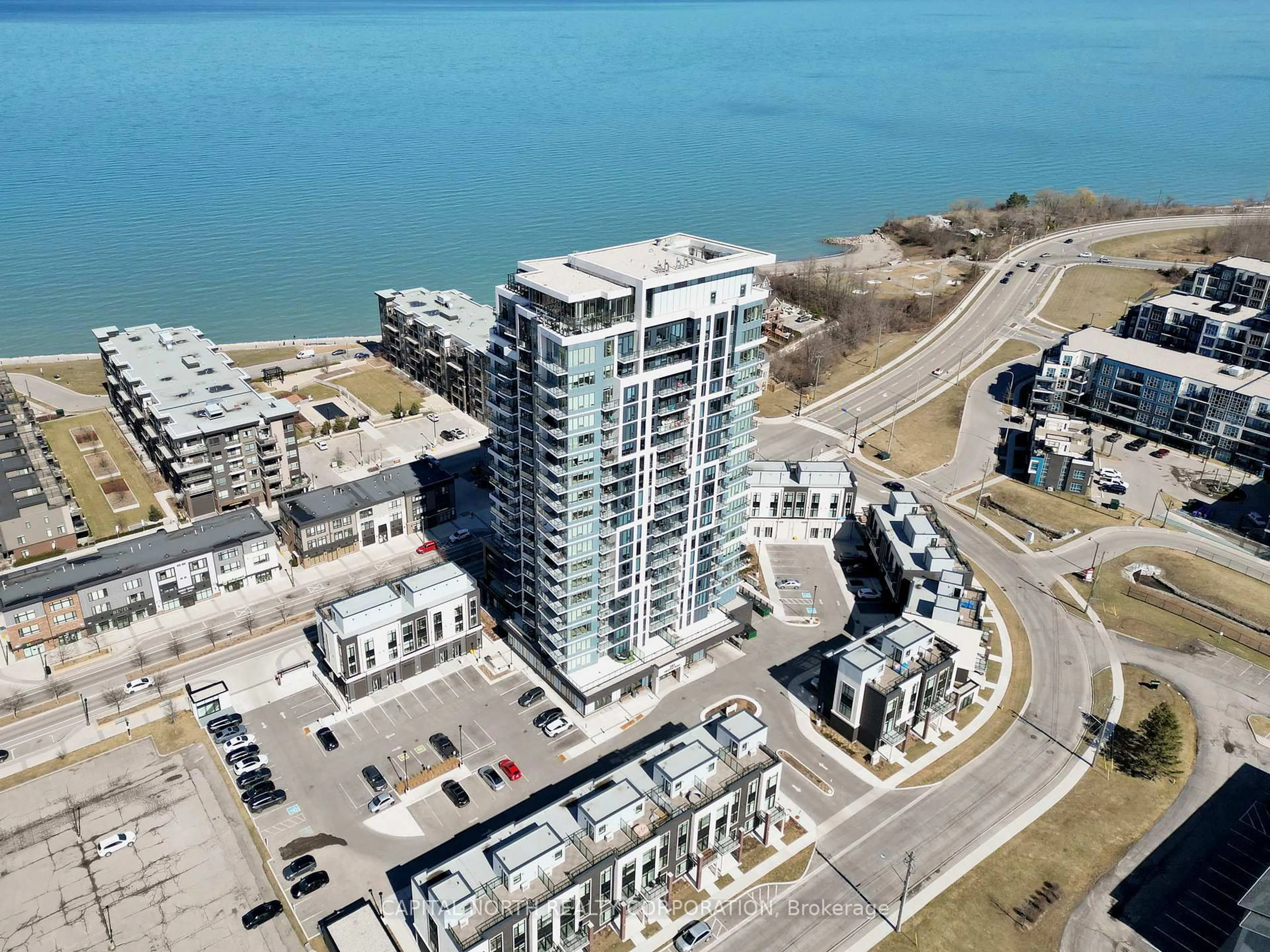 A pic from outside/outdoor area/front of a property/back of a property/a pic from drone, unknown for 385 Winston Rd #406, Grimsby Ontario L3M 0J3