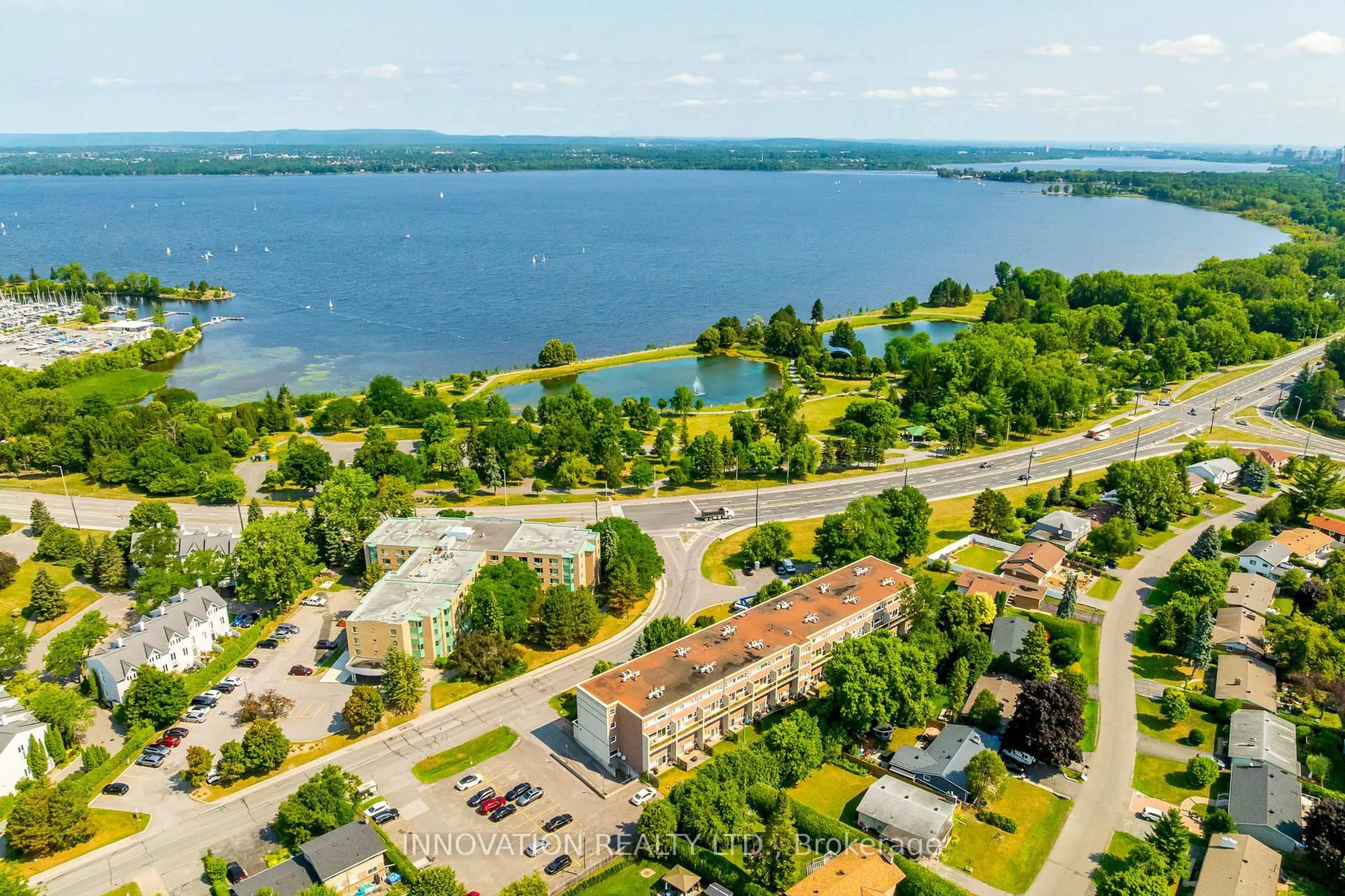A pic from outside/outdoor area/front of a property/back of a property/a pic from drone, water/lake/river/ocean view for 12 Corkstown Rd #224, Ottawa Ontario K2H 5B3