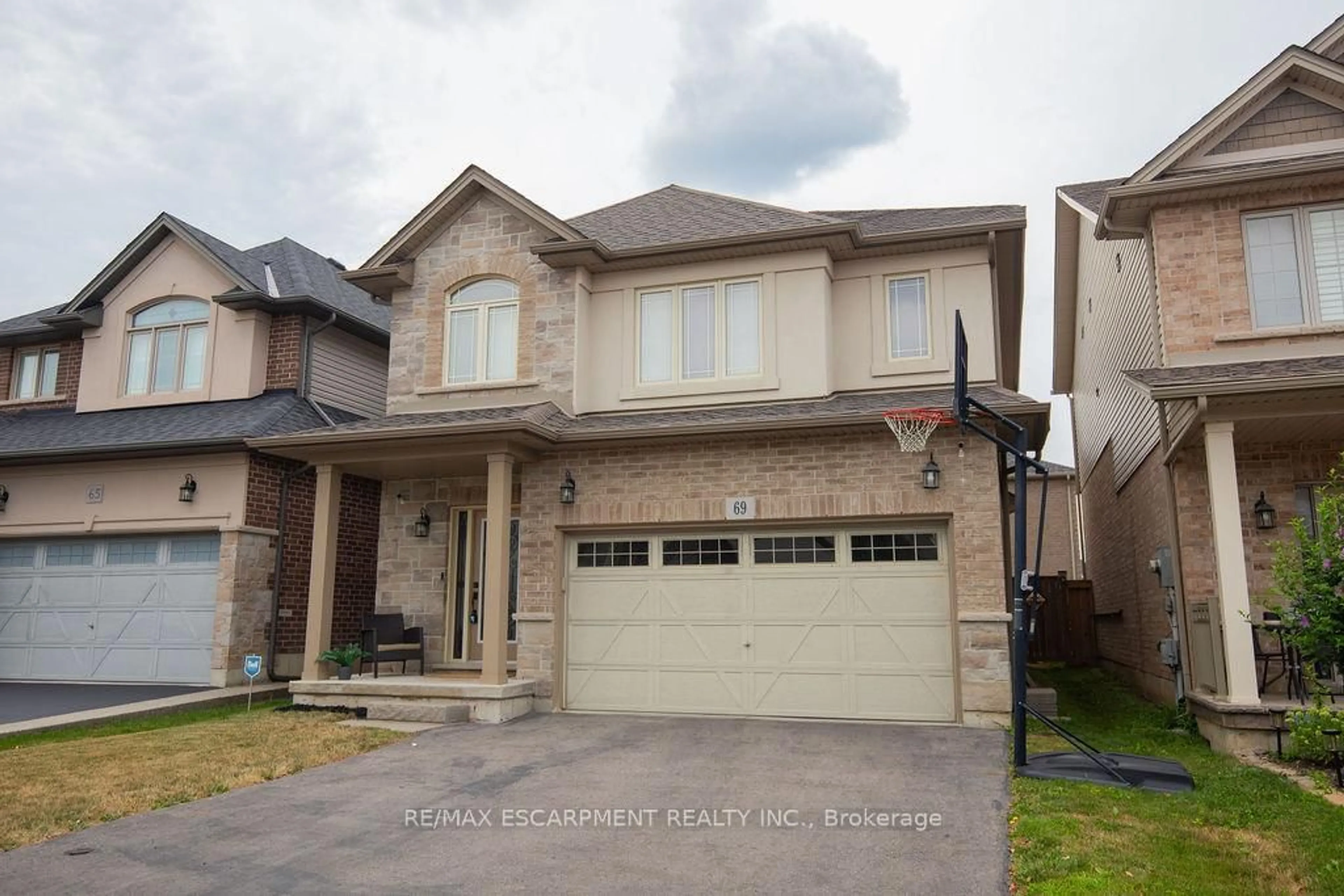 Home with brick exterior material, street for 69 Winslow Way, Hamilton Ontario L8J 0G9