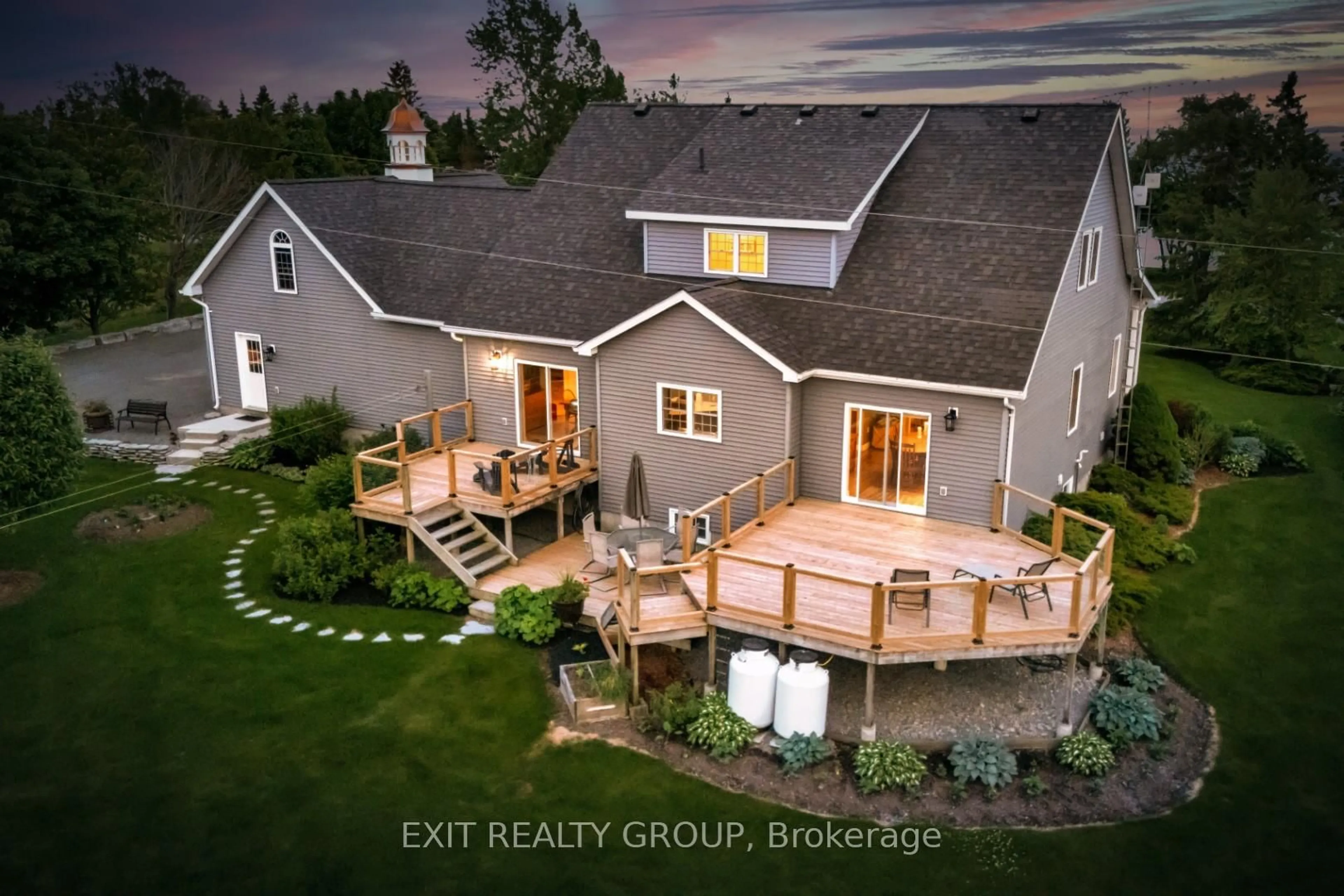 A pic from outside/outdoor area/front of a property/back of a property/a pic from drone, unknown for 830 County Rd 20, Prince Edward County Ontario K0K 3L0