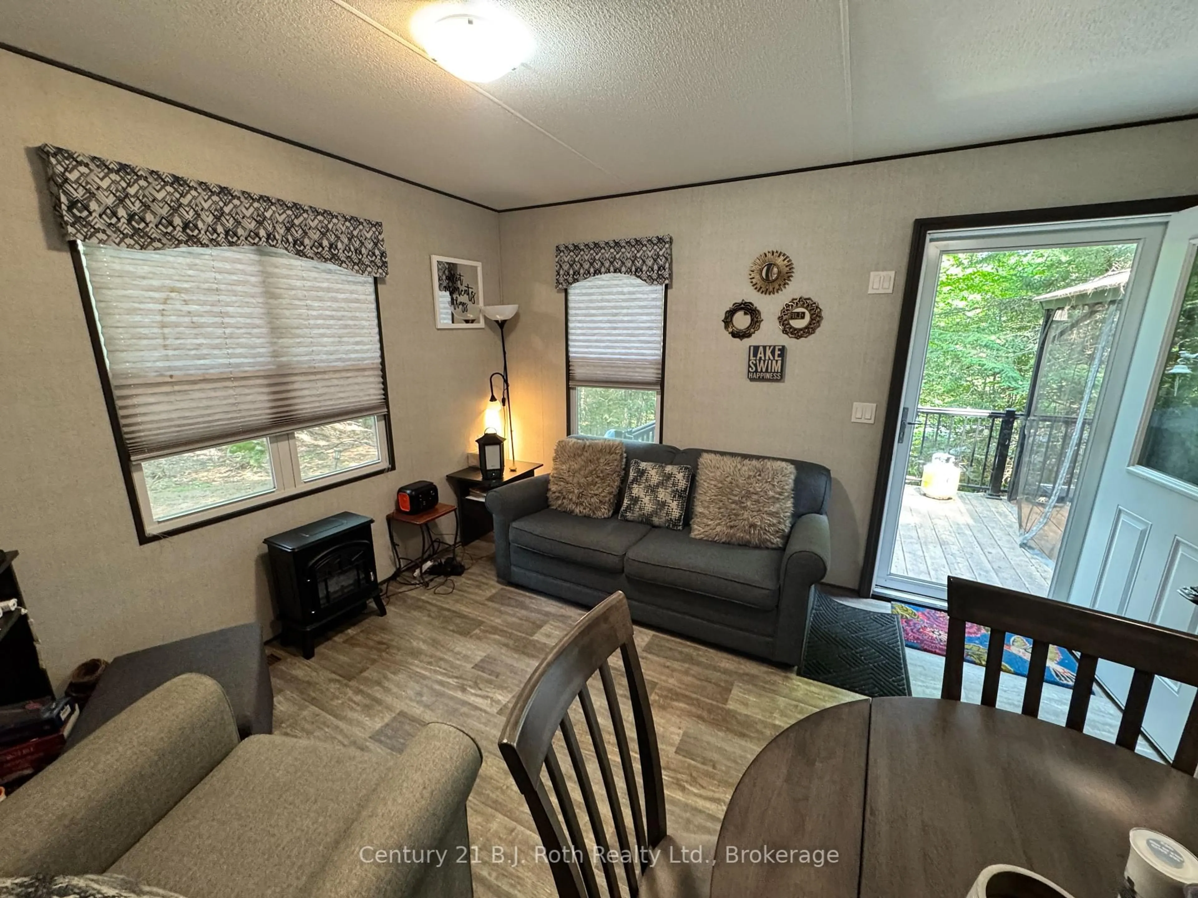 Living room with furniture, unknown for 733 Poplar Cres, Bracebridge Ontario P1H 1W9