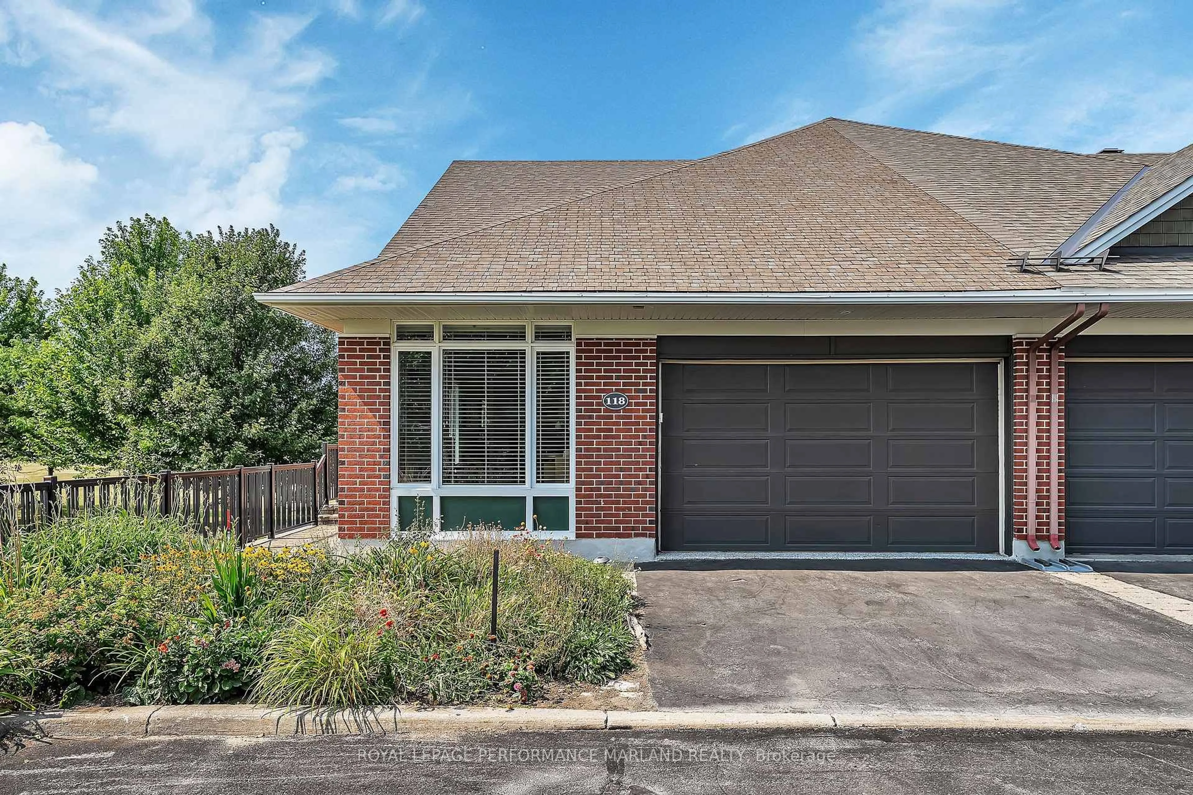 Home with brick exterior material, street for 118 Manorhill Private, Ottawa Ontario K1H 2J4