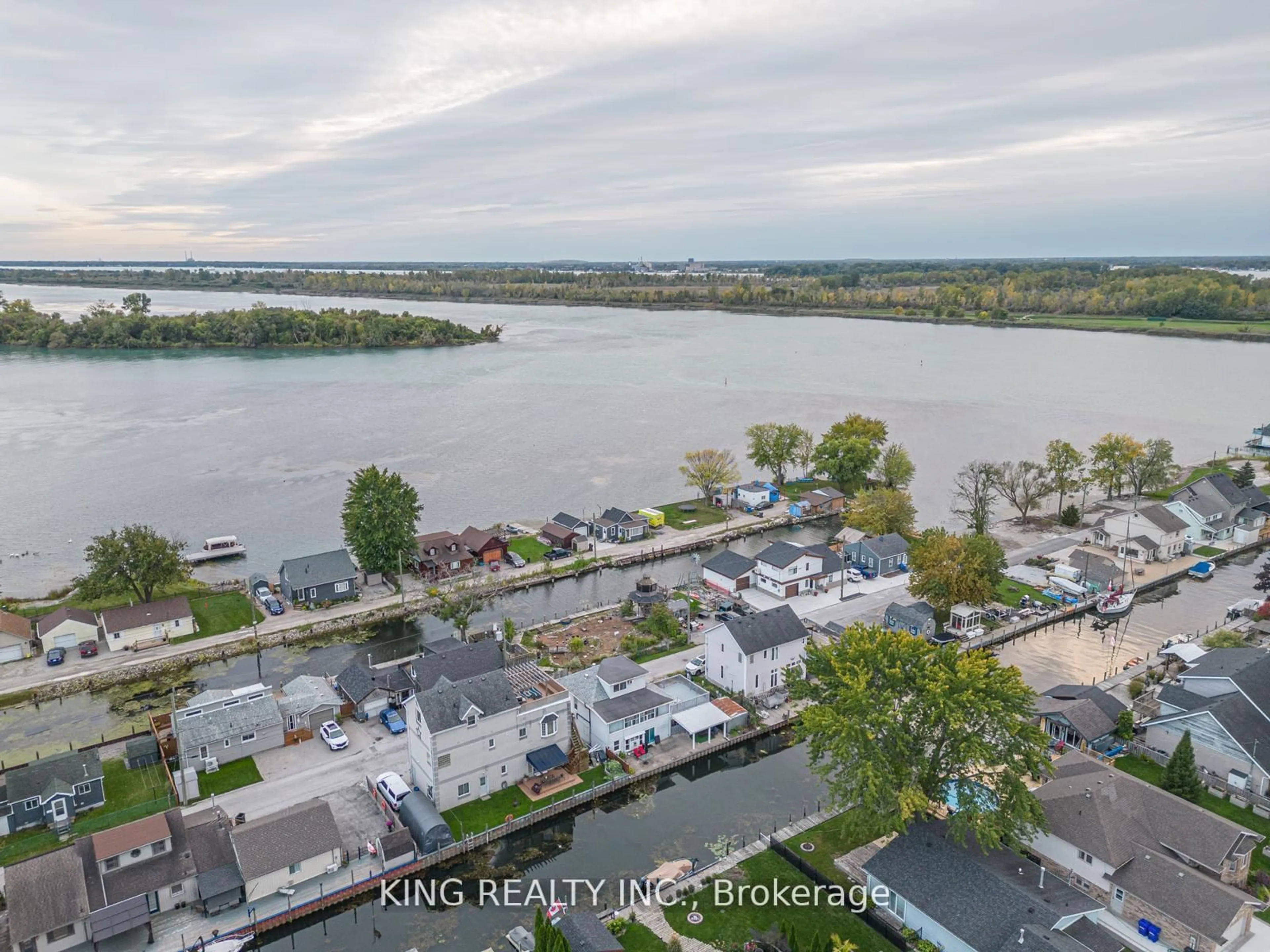 A pic from outside/outdoor area/front of a property/back of a property/a pic from drone, water/lake/river/ocean view for 42 Wahneta Ave, LaSalle Ontario N9J 1T7
