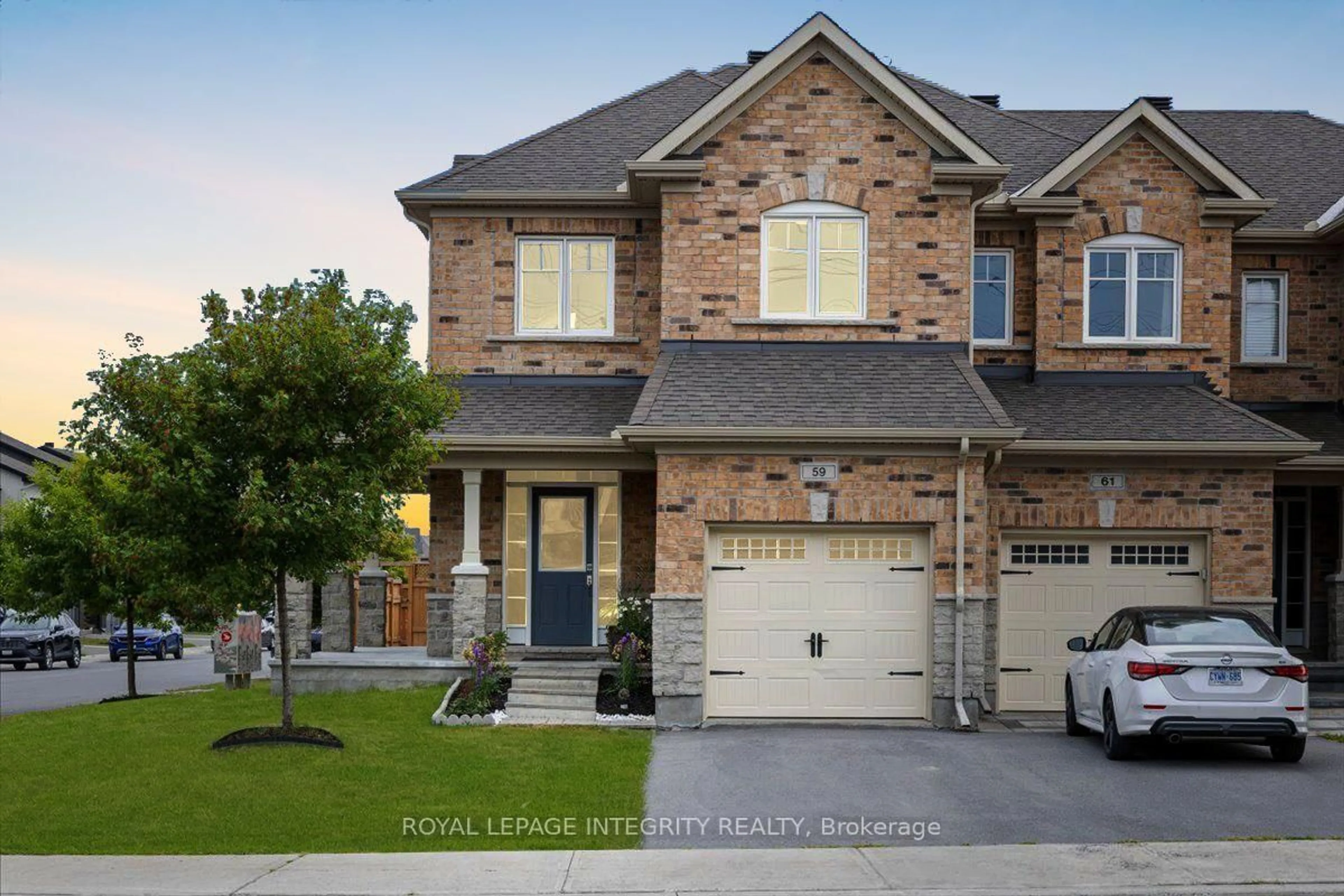 Home with brick exterior material, street for 59 Tapadero Ave, Ottawa Ontario K2V 0E1